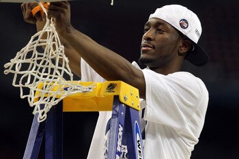 HOUSTON, TX - APRIL 04:  Kemba Walker #15 of the Connecticut Huskies cuts down the net after defeating the Butler Bulldogs to win the National Championship Game of the 2011 NCAA Division I Men's Basketball Tournament by a score of 53-41 at Reliant Stadium