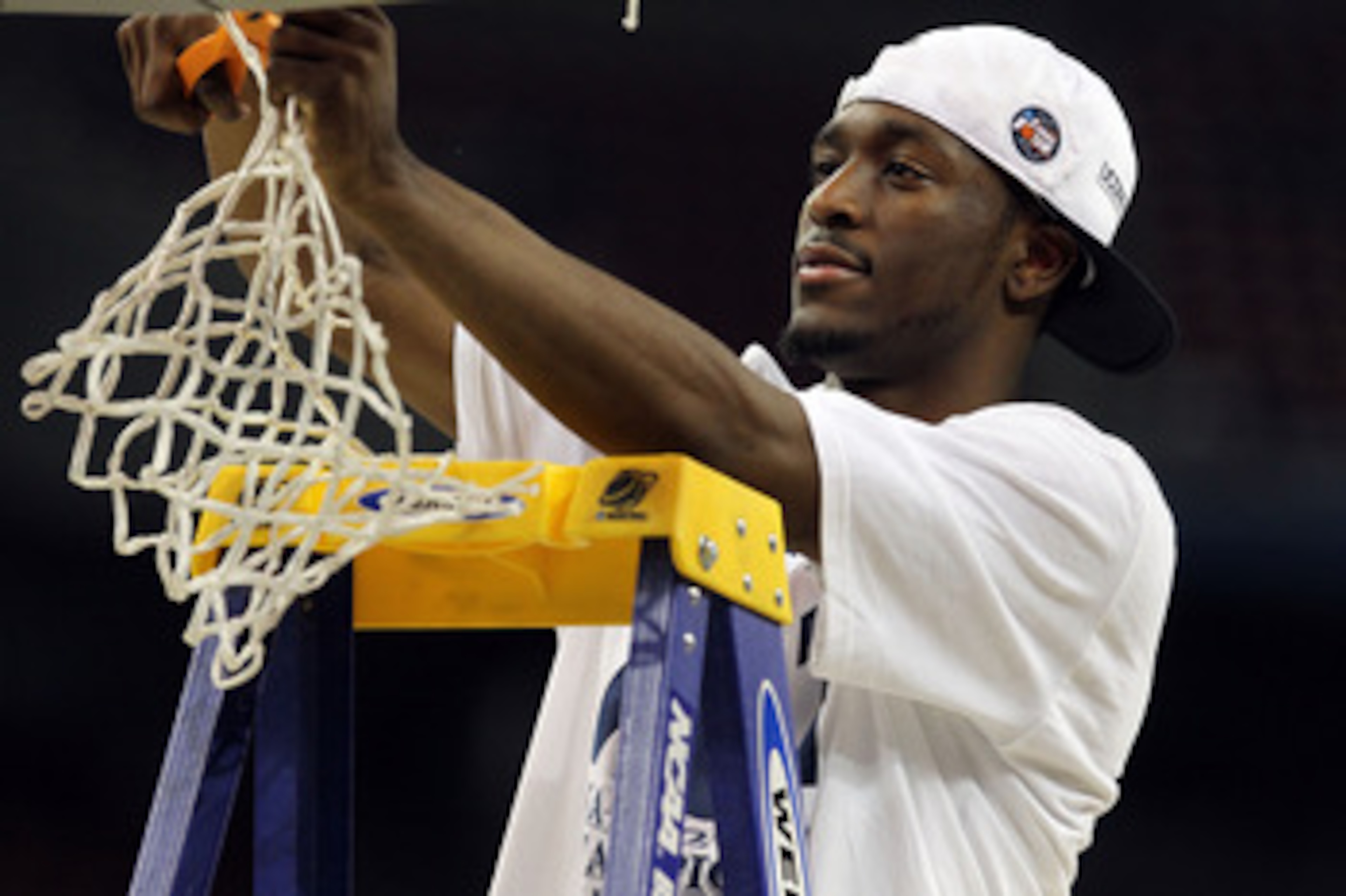 HOUSTON, TX - APRIL 04:  Kemba Walker #15 of the Connecticut Huskies cuts down the net after defeating the Butler Bulldogs to win the National Championship Game of the 2011 NCAA Division I Men's Basketball Tournament by a score of 53-41 at Reliant Stadium