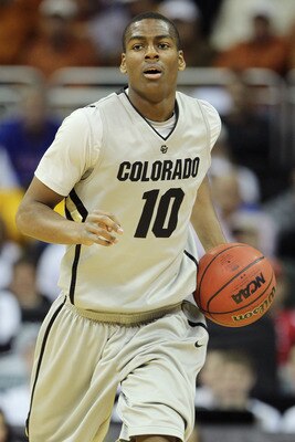 KANSAS CITY, MO - MARCH 09:  Alec Burks #10 of the Colorado Buffaloes controls the ball against the Iowa State Cyclones during the first round of the 2011 Phillips 66 Big 12 Men's Basketball Tournament at Sprint Center on March 9, 2011 in Kansas City, Mis