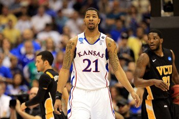SAN ANTONIO, TX - MARCH 27:  Markieff Morris #21 of the Kansas Jayhawks reacts during the southwest regional final of the 2011 NCAA men's basketball tournament against the Virginia Commonwealth Rams at the Alamodome on March 27, 2011 in San Antonio, Texas