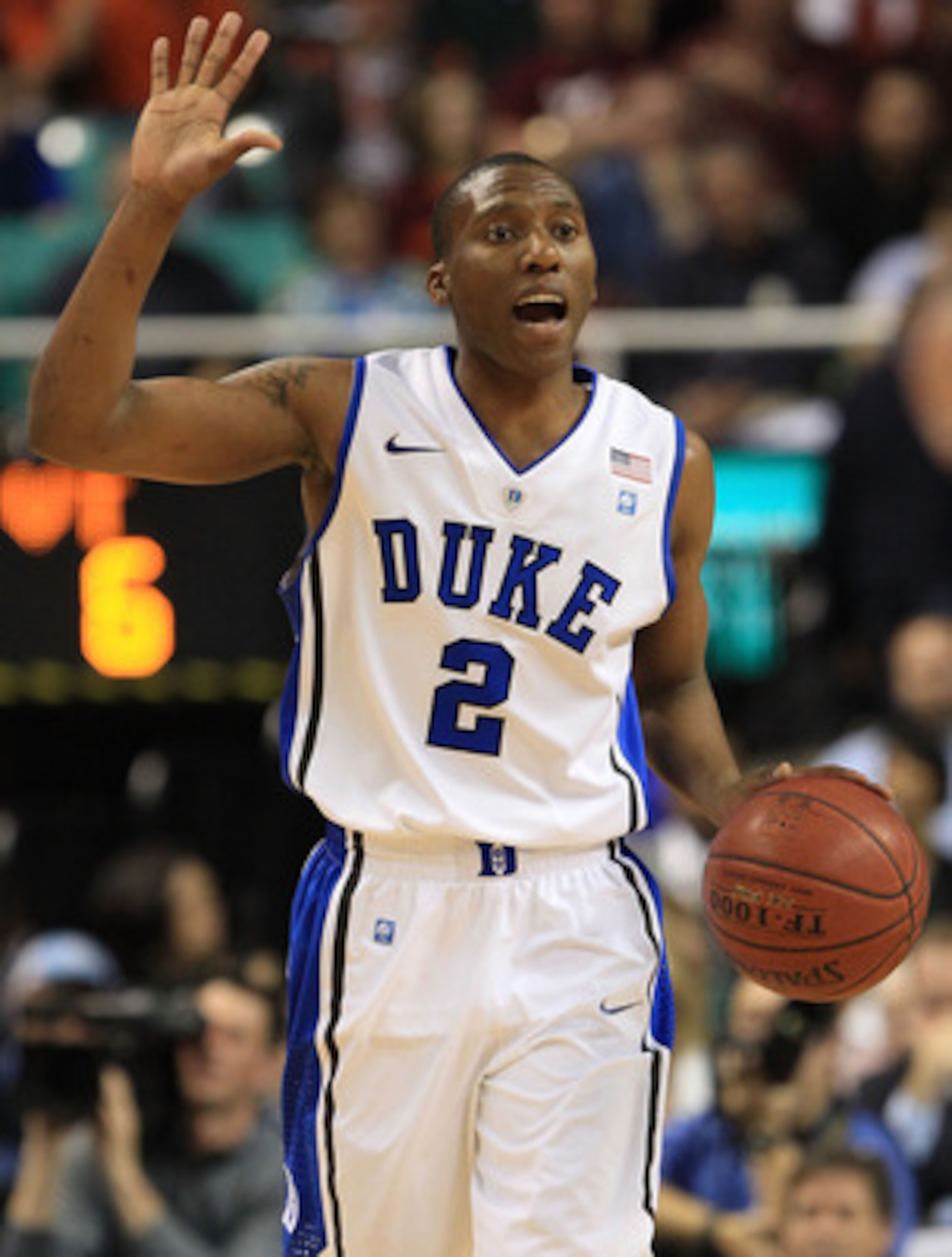 GREENSBORO, NC - MARCH 12:  Nolan Smith #2 of the Duke Blue Devils calls a play as he brings the ball up the court against the Virginia Tech Hokies during the first half in the semifinals of the 2011 ACC men's basketball tournament at the Greensboro Colis