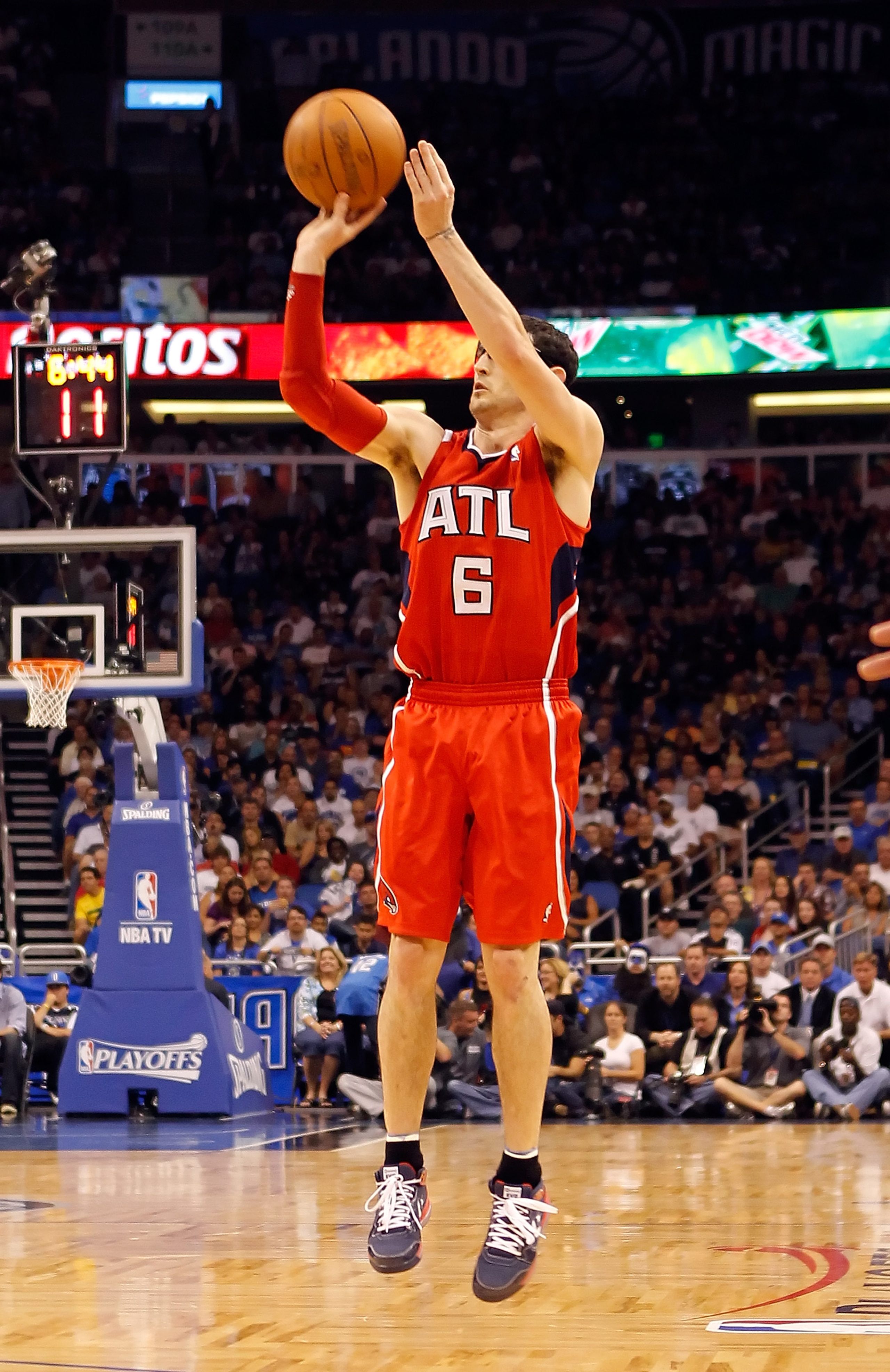 ORLANDO, FL - APRIL 19: Kirk Hinrich #6 of the Atlanta Hawks shoots against the Orlando Magic during Game Two of the Eastern Conference Quarterfinals of the 2011 NBA Playoffs on April 19, 2011 at the Amway Arena in Orlando, Florida. NOTE TO USER: User e ORLANDO, FL - APRIL 19: Kirk Hinrich #6 of the Atlanta Hawks shoots against the Orlando Magic during Game Two of the Eastern Conference Quarterfinals of the 2011 NBA Playoffs on April 19, 2011 at the Amway Arena in Orlando, Florida. NOTE TO USER: User e