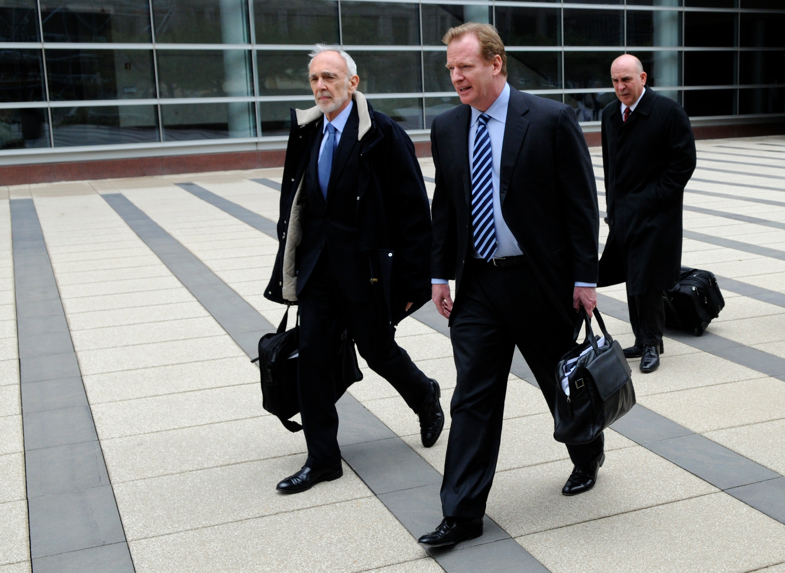 MINNEAPOLIS, MN - APRIL 20: NFL lawyer Bob Batterman and NFL Commissioner Roger Goodell leave court ordered mediation at the U.S. Courthouse on April 20, 2011 in Minneapolis, Minnesota. Mediation was order after a hearing on an antitrust lawsuit filed by