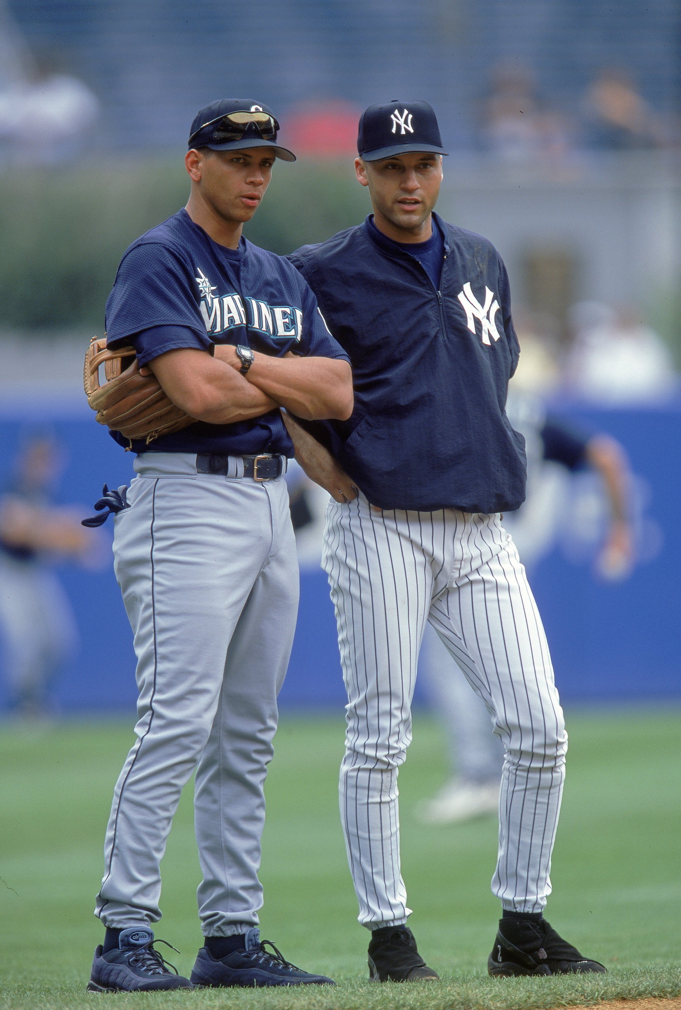 6 Aug 2000:  Derek Jeter #2 of the New York Yankees talks with Alex Rodriguez #3 of the Seattle Mariners during practice before the game at Yankee Stadium in the Bronx, New York. The Mariners defeated the Yankees 11-1.Mandatory Credit: Jamie Squire  /Alls
