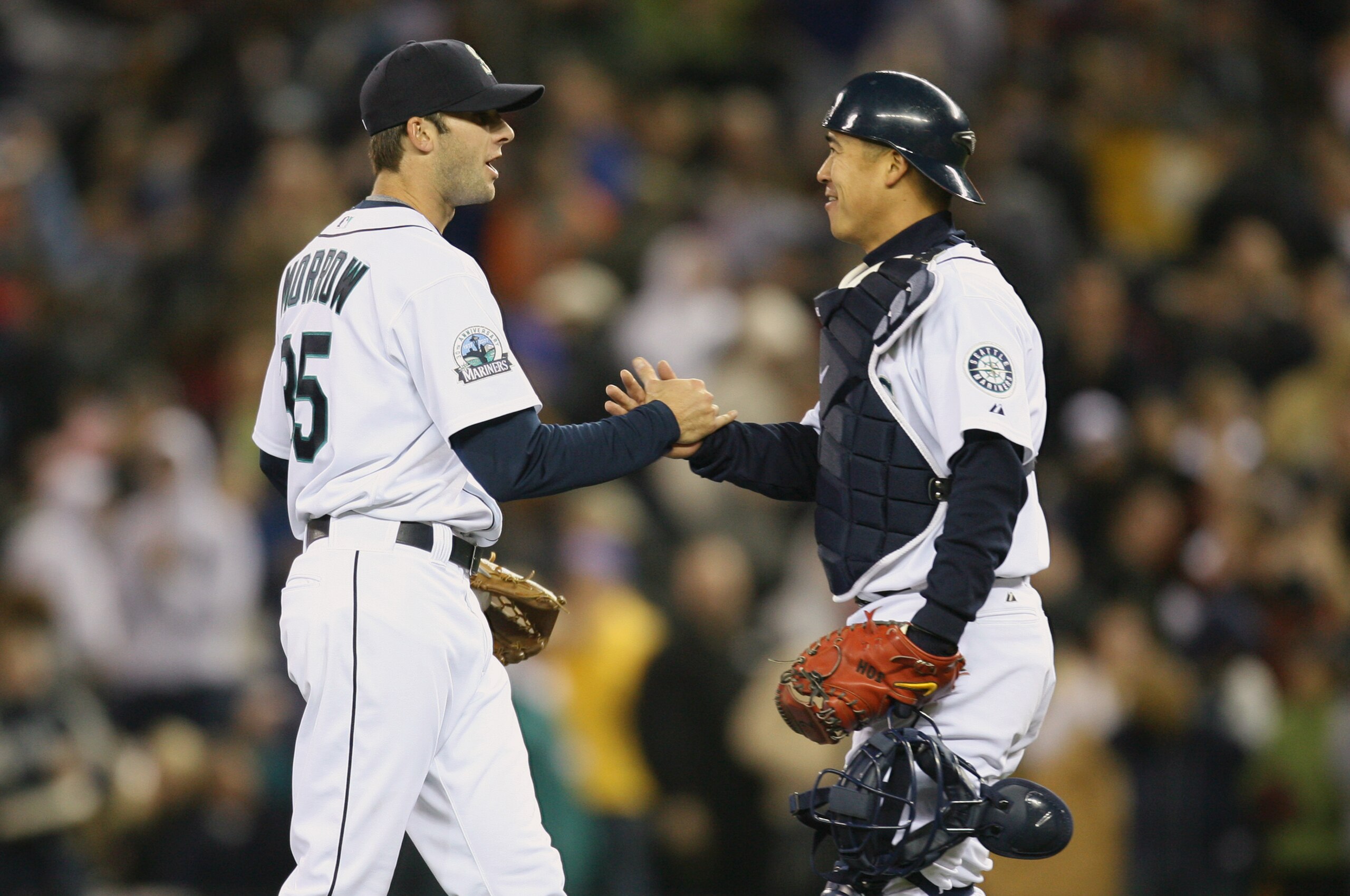 SEATTLE - APRIL 3:  Brandon Morrow #35 and Kenji Johjima #2 of the Seattle Mariners celebrate following the game against the Oakland Athletics on April 3, 2007 at Safeco Field in Seattle, Washington. The Mariners defeated the A's 8-4. (Photo by Otto Greul