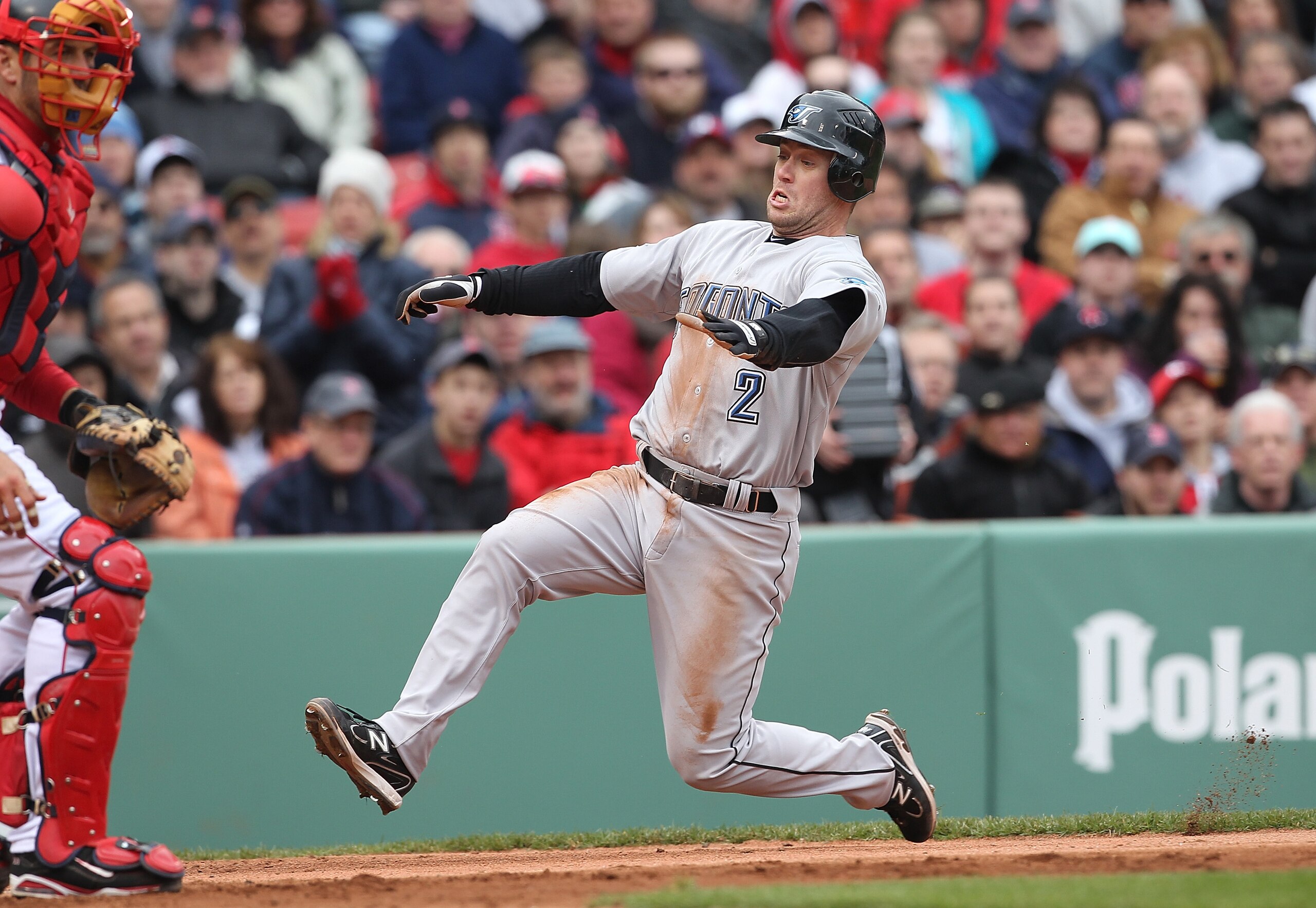 BOSTON, MA - APRIL 16, 2011: Aaron Hill #2 of the Toronto Blue Jays scores against the Boston Red Sox at Fenway Park April 16, 2011 in Boston, Massachusetts. (Photo by Jim Rogash/Getty Images) BOSTON, MA - APRIL 16, 2011: Aaron Hill #2 of the Toronto Blue Jays scores against the Boston Red Sox at Fenway Park April 16, 2011 in Boston, Massachusetts. (Photo by Jim Rogash/Getty Images)