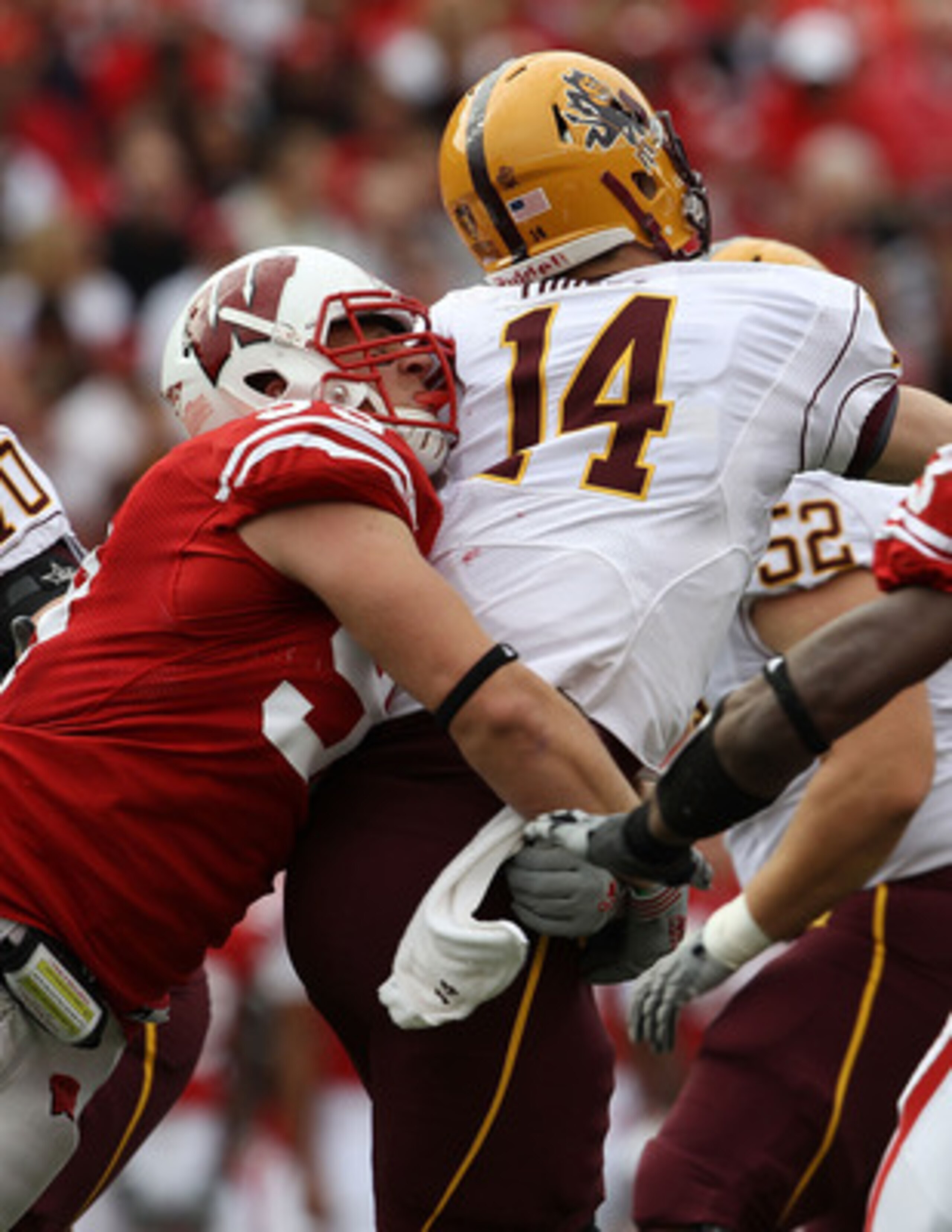MADISON, WI - SEPTEMBER 18: J.J. Watt #99 of the Wisconsin Badgers hits Steven Threet #14 of the Arizona State Sun Devils at Camp Randall Stadium on September 18, 2010 in Madison, Wisconsin. Wisconsin defeated Arizona State 20-19. (Photo by Jonathan Danie MADISON, WI - SEPTEMBER 18: J.J. Watt #99 of the Wisconsin Badgers hits Steven Threet #14 of the Arizona State Sun Devils at Camp Randall Stadium on September 18, 2010 in Madison, Wisconsin. Wisconsin defeated Arizona State 20-19. (Photo by Jonathan Danie