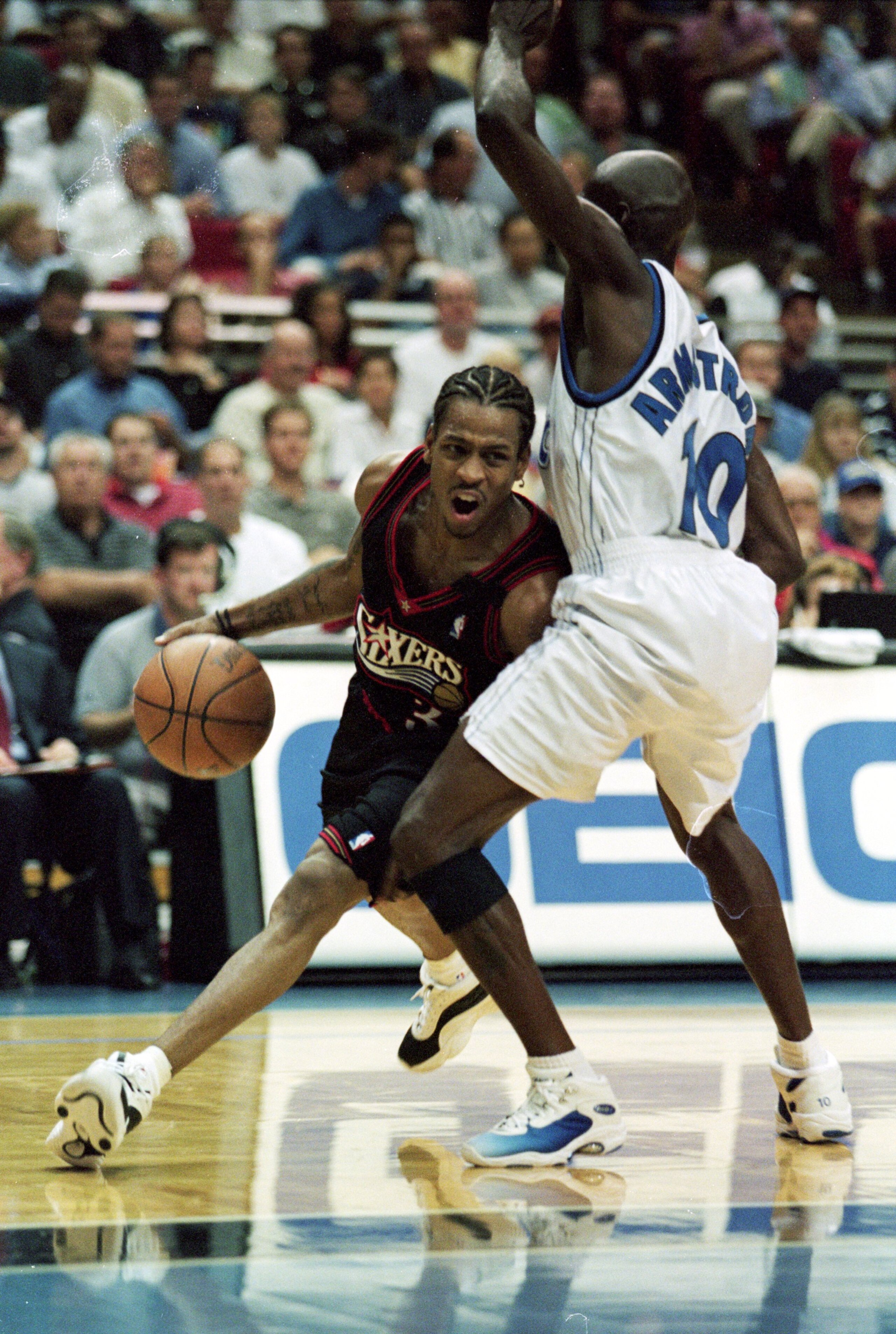 10 Nov 1999:  Allen Iverson #3 of the Philadelphia 76ers moves with the ball as Darrell Armstrong #10 of the Orlando Magic tries to block him during the game at the Orlando Arena in Orlando, Florida. The Magic defeated the 76ers 110-105.   Mandatory Credi