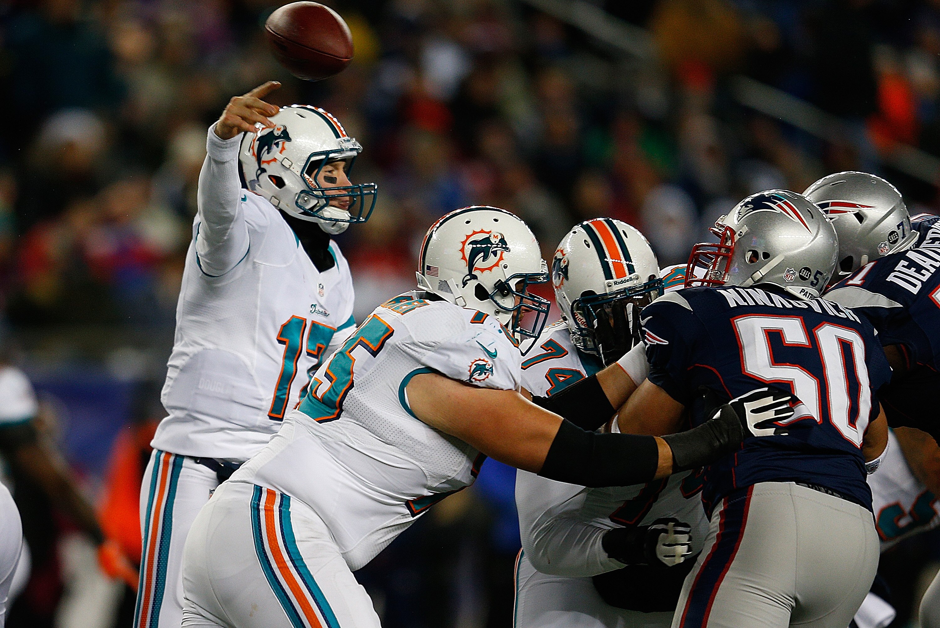 FOXBORO, MA - DECEMBER 30: Ryan Tannehill #17 of the Miami Dolphins throws against the New England Patriots in the second half at Gillette Stadium on December 30, 2012 in Foxboro, Massachusetts. (Photo by Jim Rogash/Getty Images)