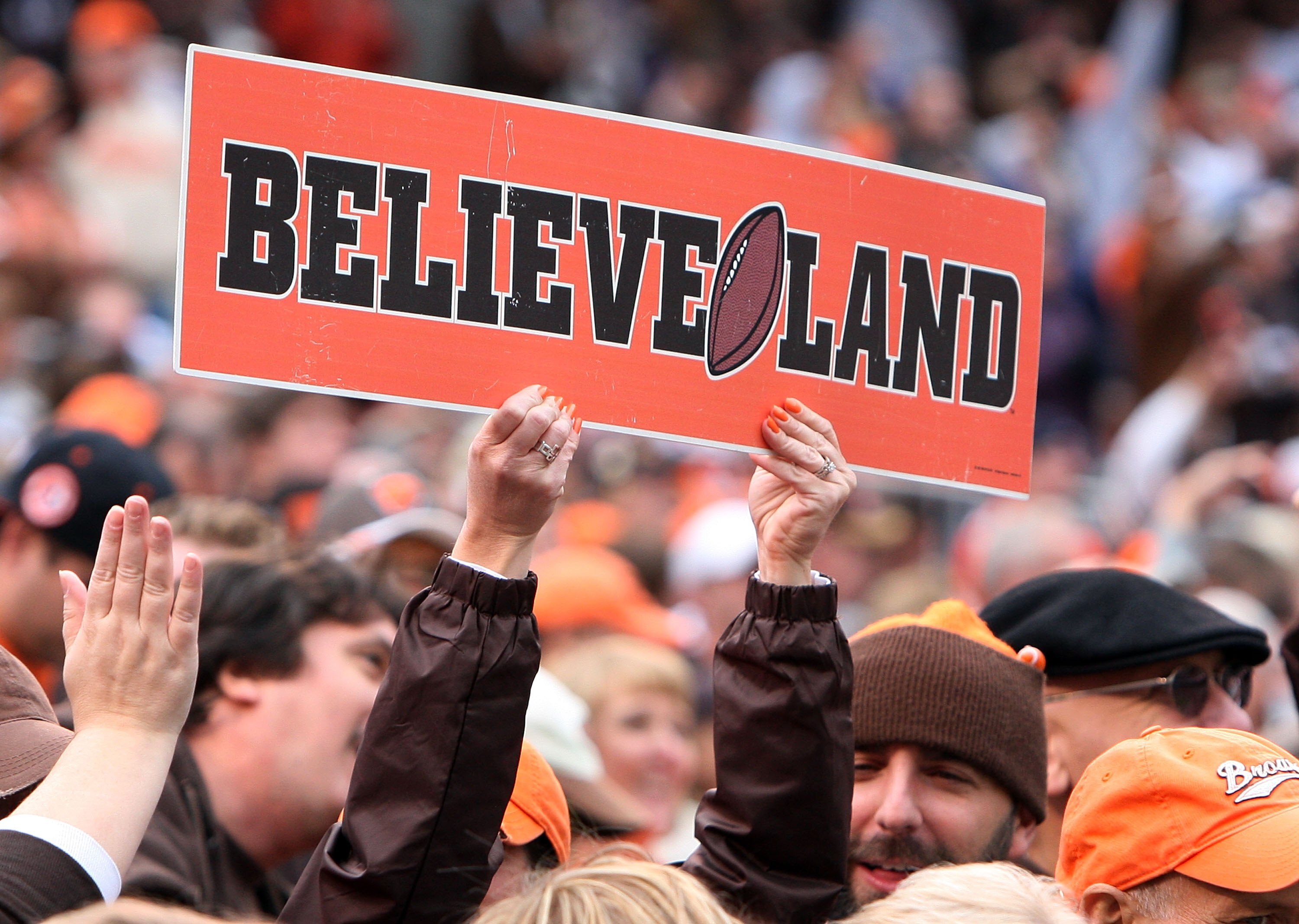 CLEVELAND - OCTOBER 04:  A fan of the Cleveland Browns cheers on his team as they play the Cincinnati Bengals at Cleveland Browns Stadium on October 4, 2009 in Cleveland, Ohio.  (Photo by Jim McIsaac/Getty Images)