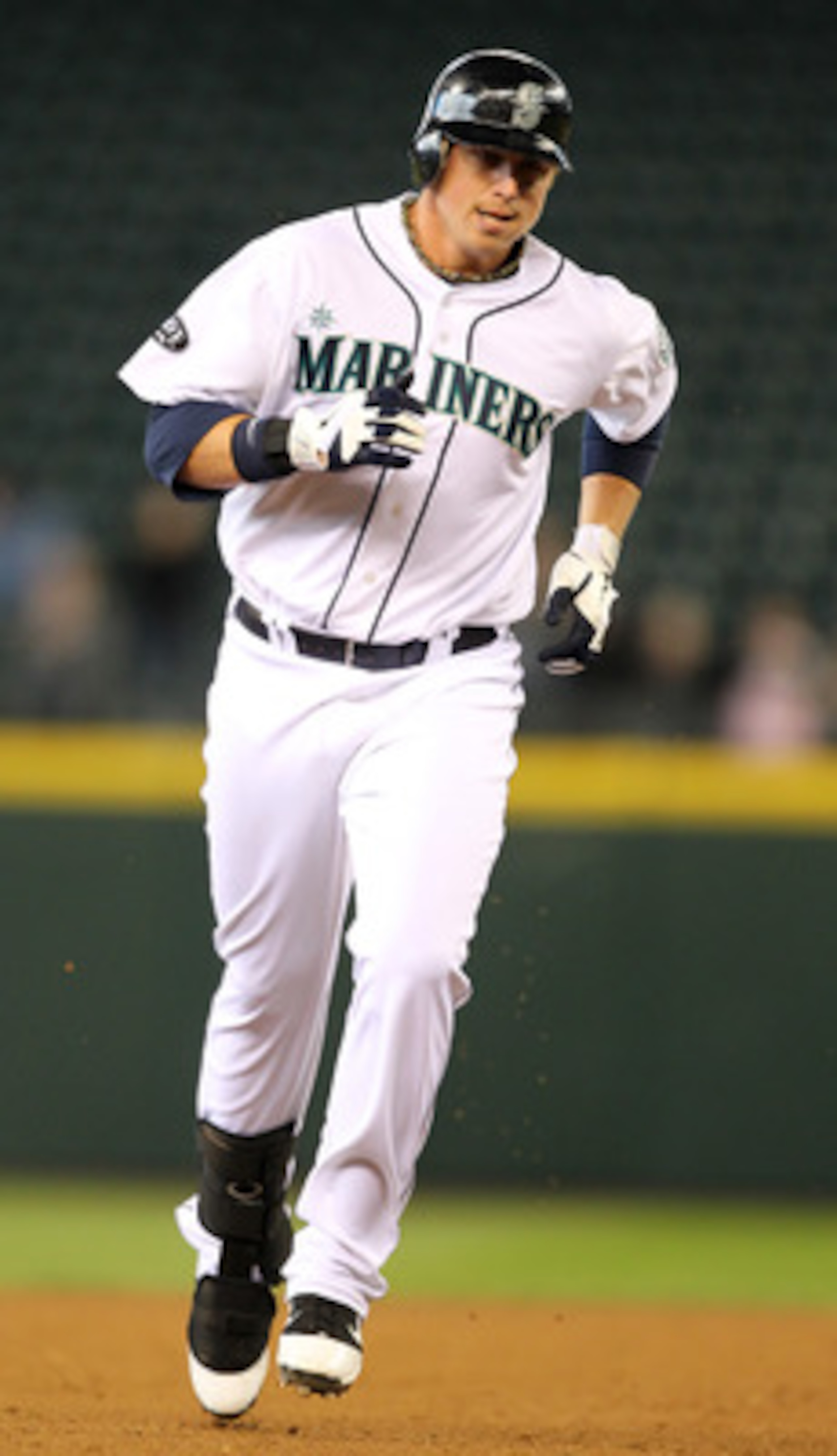 SEATTLE, WA - APRIL 13:  Justin Smoak #17 of the Seattle Mariners rounds the bases after hitting a solo home run in the sixth inning against the Toronto Blue Jays at Safeco Field on April 13, 2011 in Seattle, Washington. (Photo by Otto Greule Jr/Getty Ima