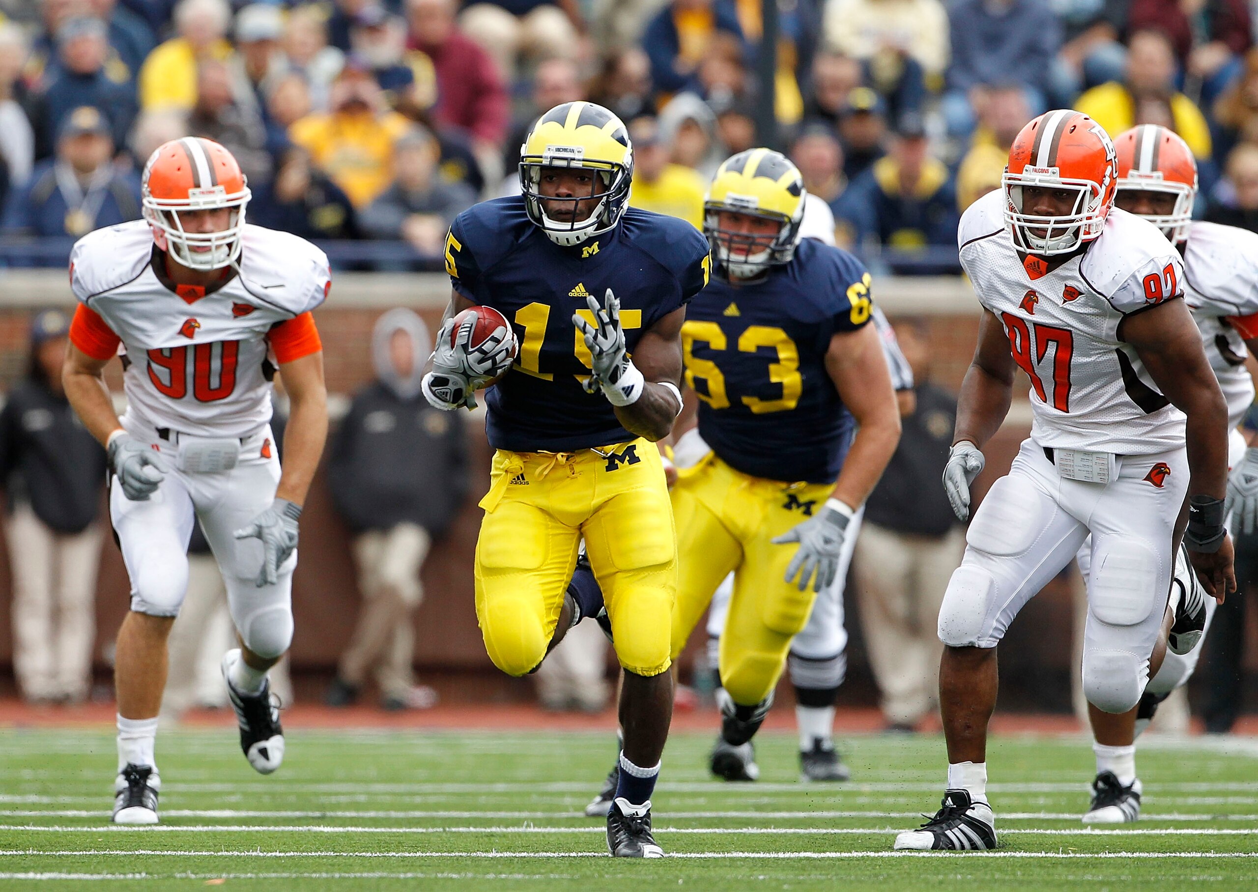 ANN ARBOR, MI - SEPTEMBER 25: Michael Cox #15 of the Michigan Wolverines runs for a 35 yard gain in the fourth quarter during the game against Bowling Green on September 25, 2010 at Michigan Stadium in Ann Arbor, Michigan. Michigan defeated Bowling Green 