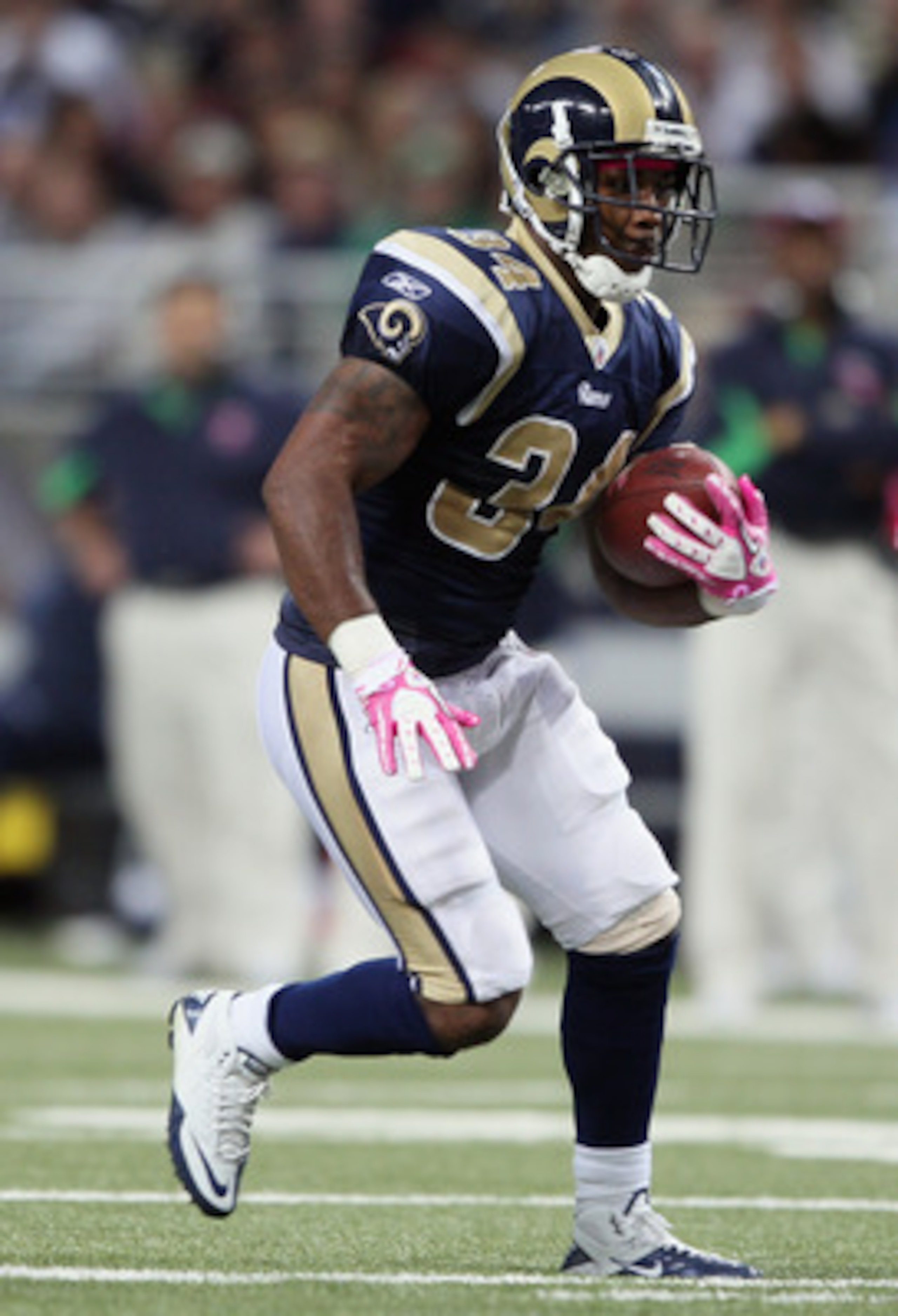 ST. LOUIS - OCTOBER 03: Kenneth Darby #34 of the St. Louis Rams carries the ball in the second half against the Seattle Seahawks on October 3, 2010 at Edward Jones Dome in St. Louis, Missouri. The Rams defeated the Seahawks 20-3.  (Photo by Elsa/Getty Ima