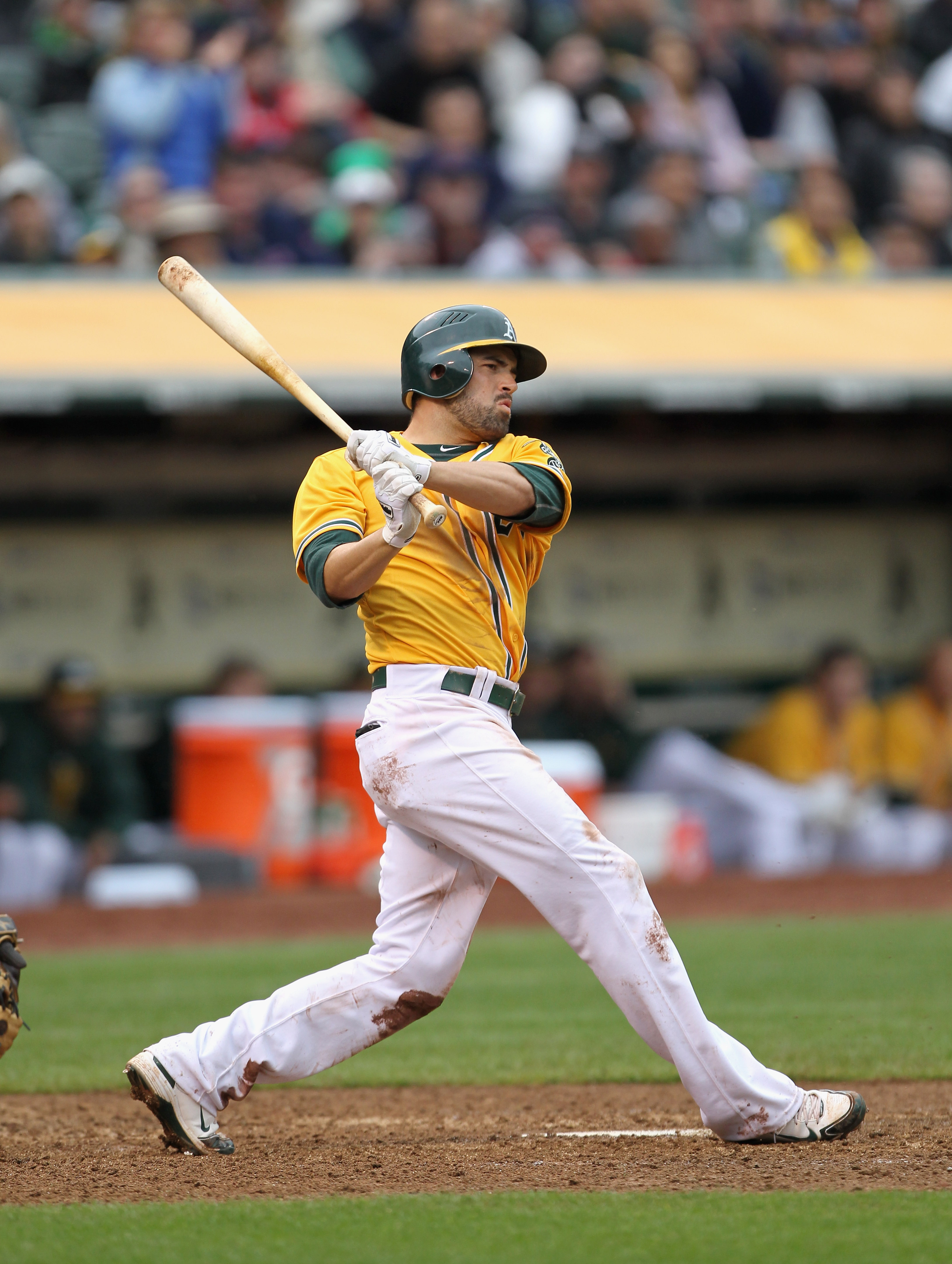 OAKLAND, CA - APRIL 20:  David DeJesus #12 of the Oakland Athletics in action against the Boston Red Sox at Oakland-Alameda County Coliseum on April 20, 2011 in Oakland, California.  (Photo by Ezra Shaw/Getty Images)
