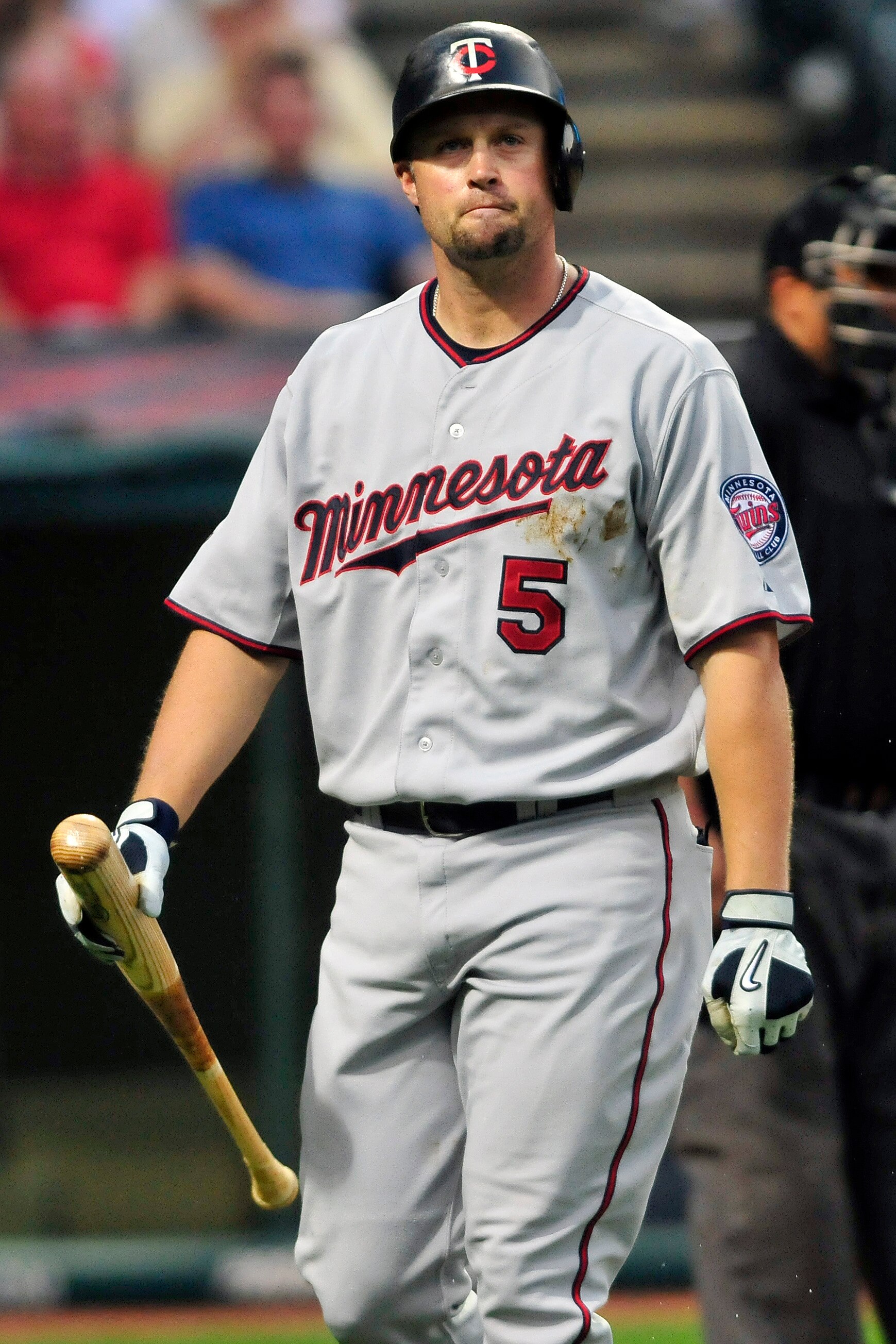 CLEVELAND, OH - JUNE 7: Michael Cuddyer #5 of the Minnesota Twins reacts to striking out in the seventh inning against the Cleveland Indians at Progressive Field on June 7, 2011 in Cleveland, Ohio. The Indians defeated the Twins 1-0. (Photo by Jason Mille