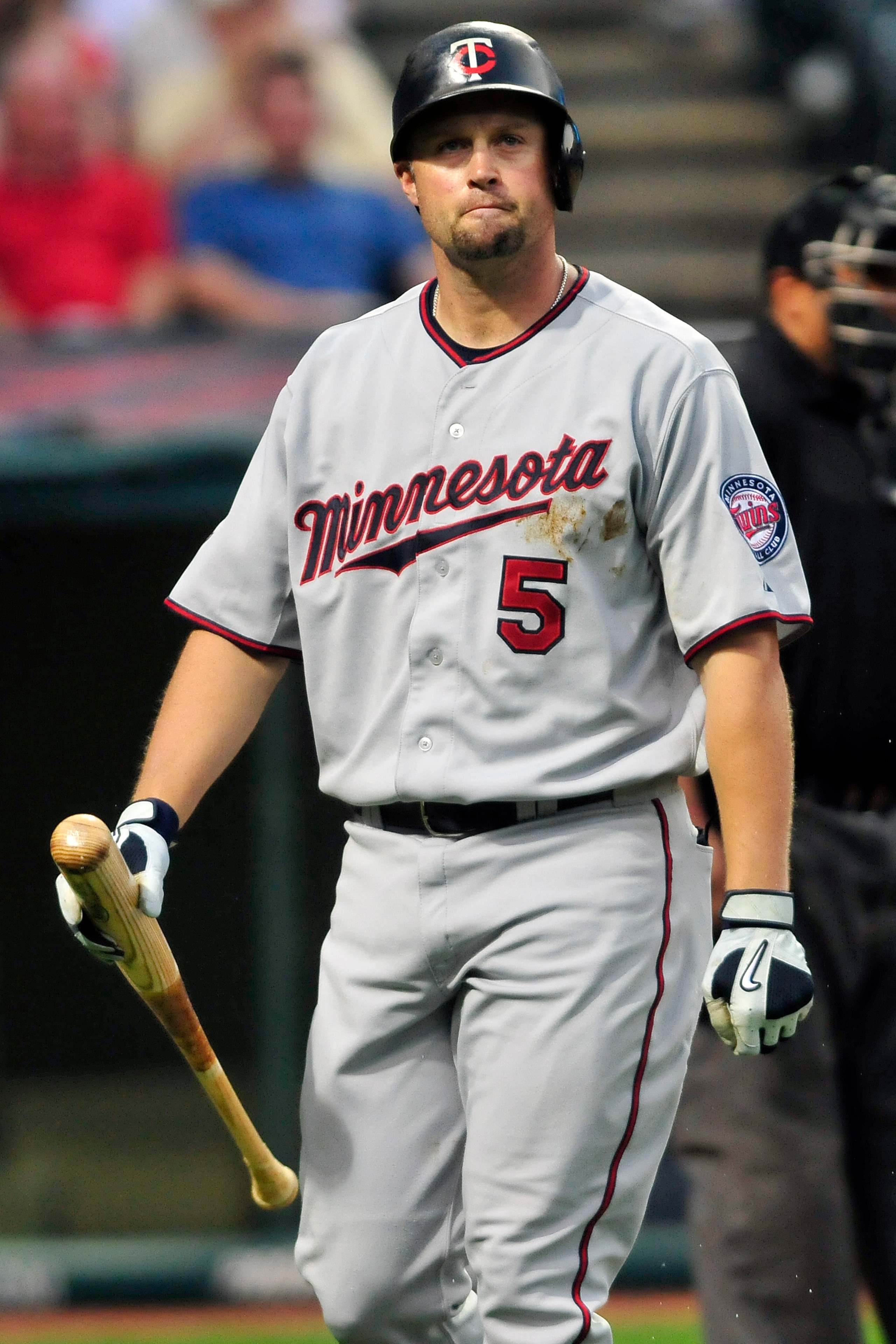 CLEVELAND, OH - JUNE 7: Michael Cuddyer #5 of the Minnesota Twins reacts to striking out in the seventh inning against the Cleveland Indians at Progressive Field on June 7, 2011 in Cleveland, Ohio. The Indians defeated the Twins 1-0. (Photo by Jason Mille