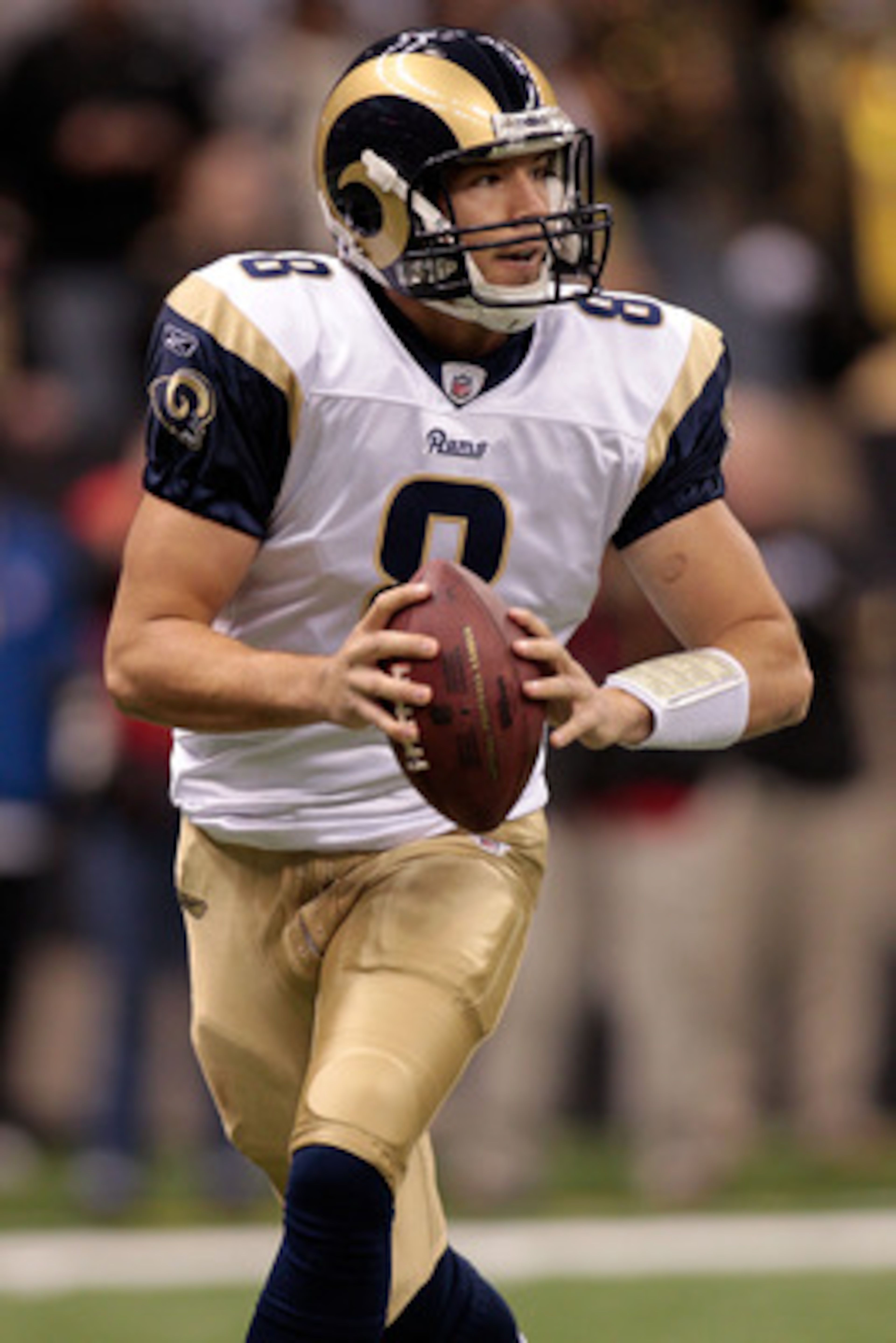 NEW ORLEANS, LA - DECEMBER 12:  Quarterback Sam Bradford #8 of the St. Louis Rams looks to throw a pass during the game against the New Orleans Saints at the Louisiana Superdome on December 12, 2010 in New Orleans, Louisiana.  (Photo by Chris Graythen/Get