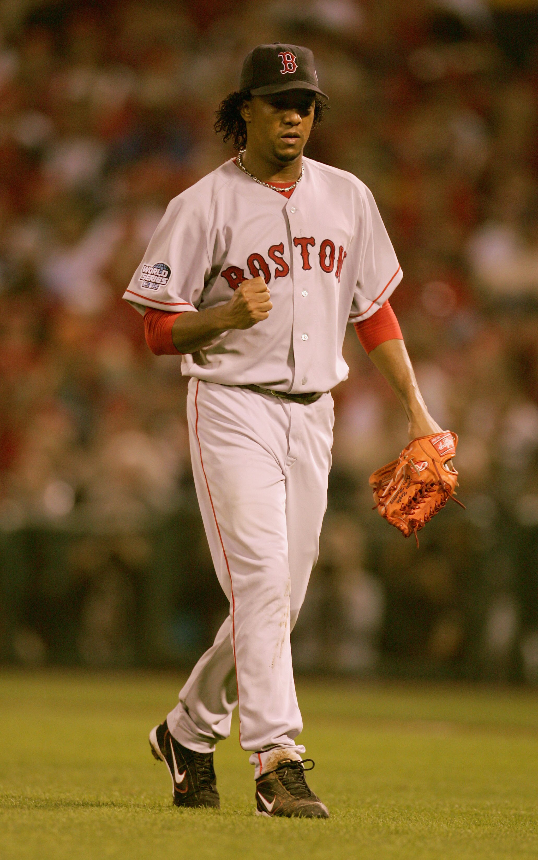 ST LOUIS - OCTOBER 26:  Pedro Martinez #45 of the Boston Red Sox pumps his fist as he walks off the field after ending the inning against the St. Louis Cardinals during game three of the World Series on October 26, 2004 at Busch Stadium in St. Louis, Miss