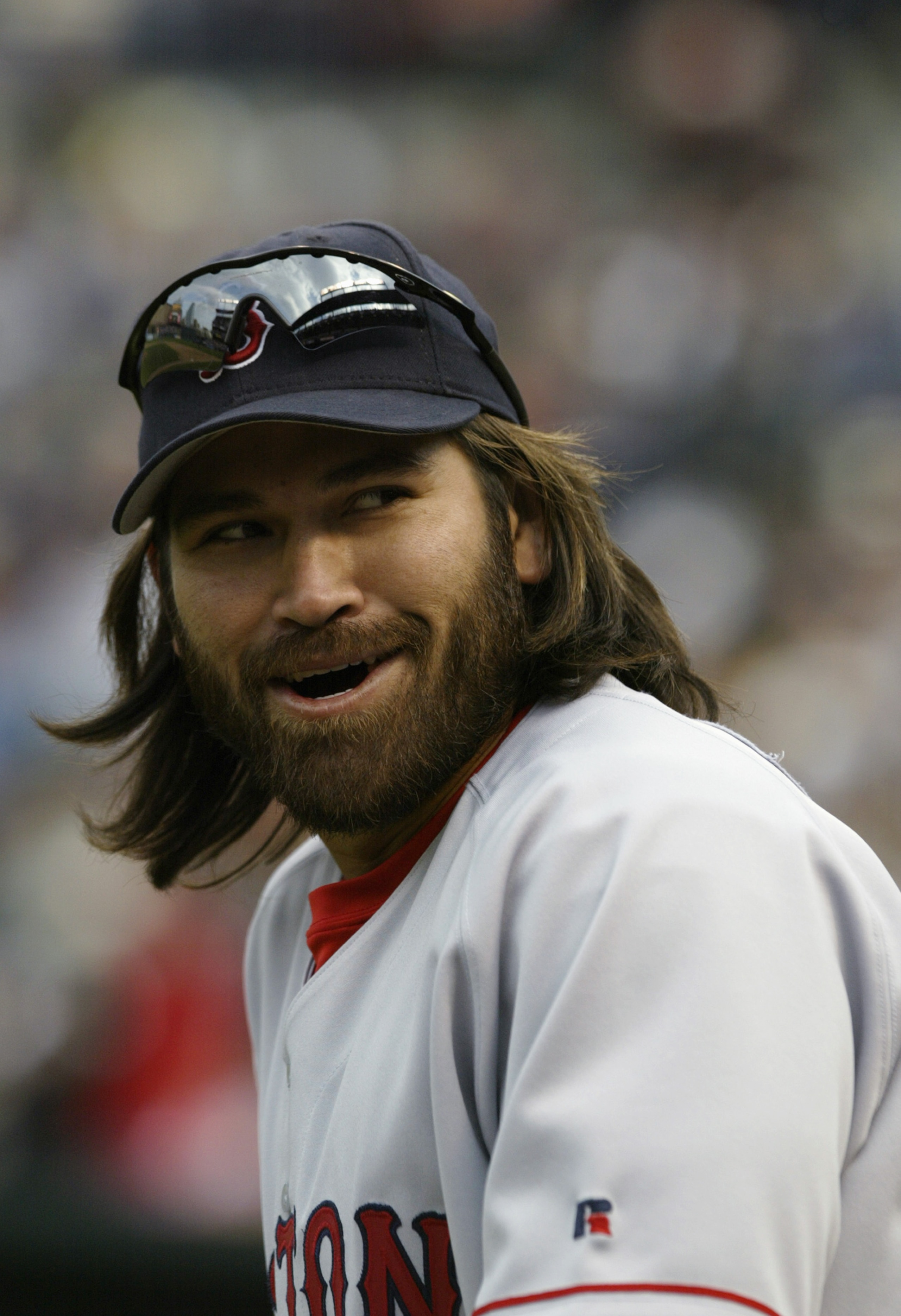 BALTIMORE, MD - APRIL 6:  Centerfielder Johnny Damon #18 of the Boston Red Sox in the dugout during the game against the Baltimore Orioles at Camden Yards on April 6, 2004 in Baltimore, Maryland.  The Sox defeated the Orioles 4- 1. (Photo by Chris Trotman