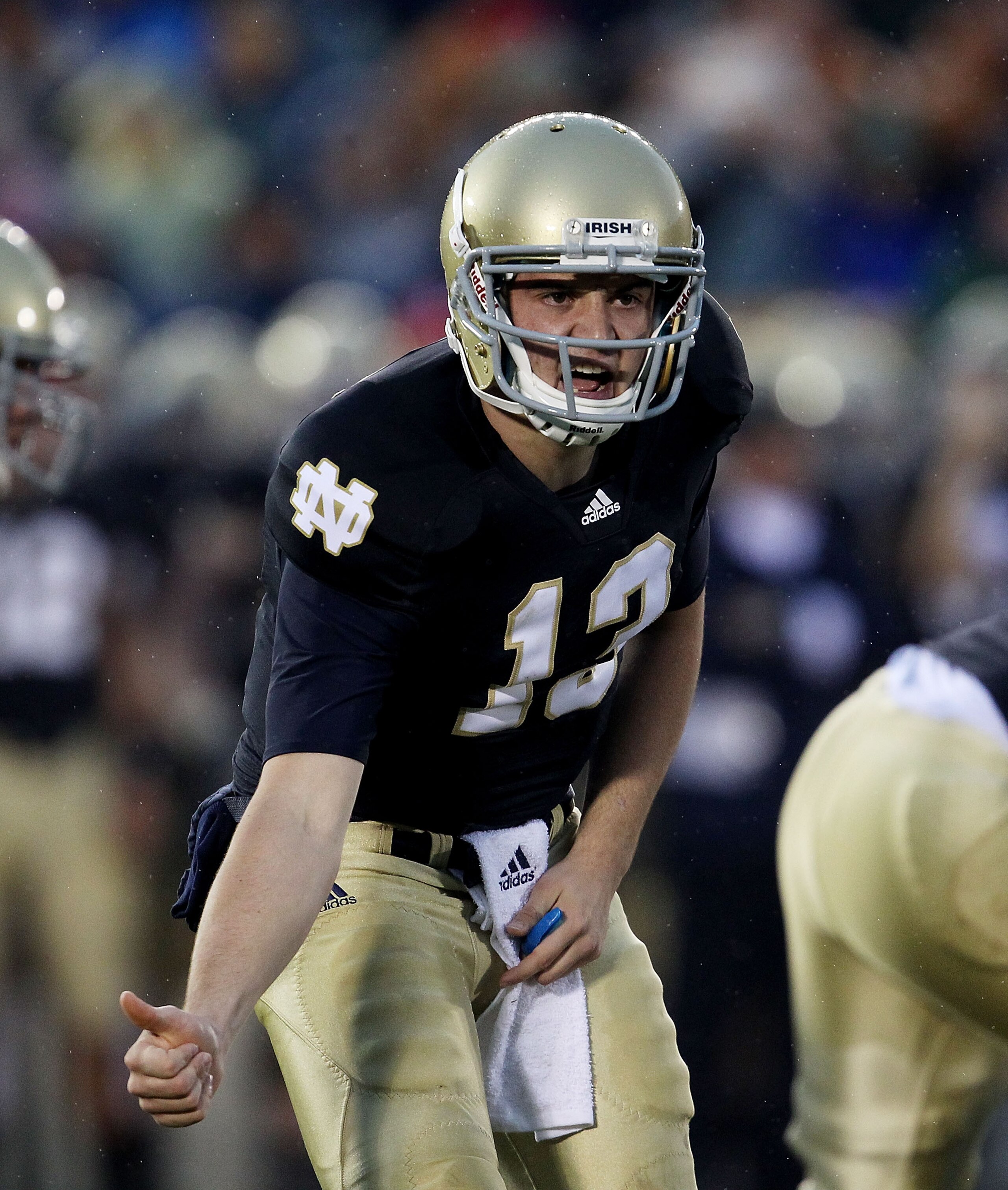 SOUTH BEND, IN - NOVEMBER 13: Tommy Rees #13 of the Notre Dame Fighting Irish calls a play at the line of scrimmage against the Utah Utes at Notre Dame Stadium on November 13, 2010 in South Bend, Indiana. (Photo by Jonathan Daniel/Getty Images)