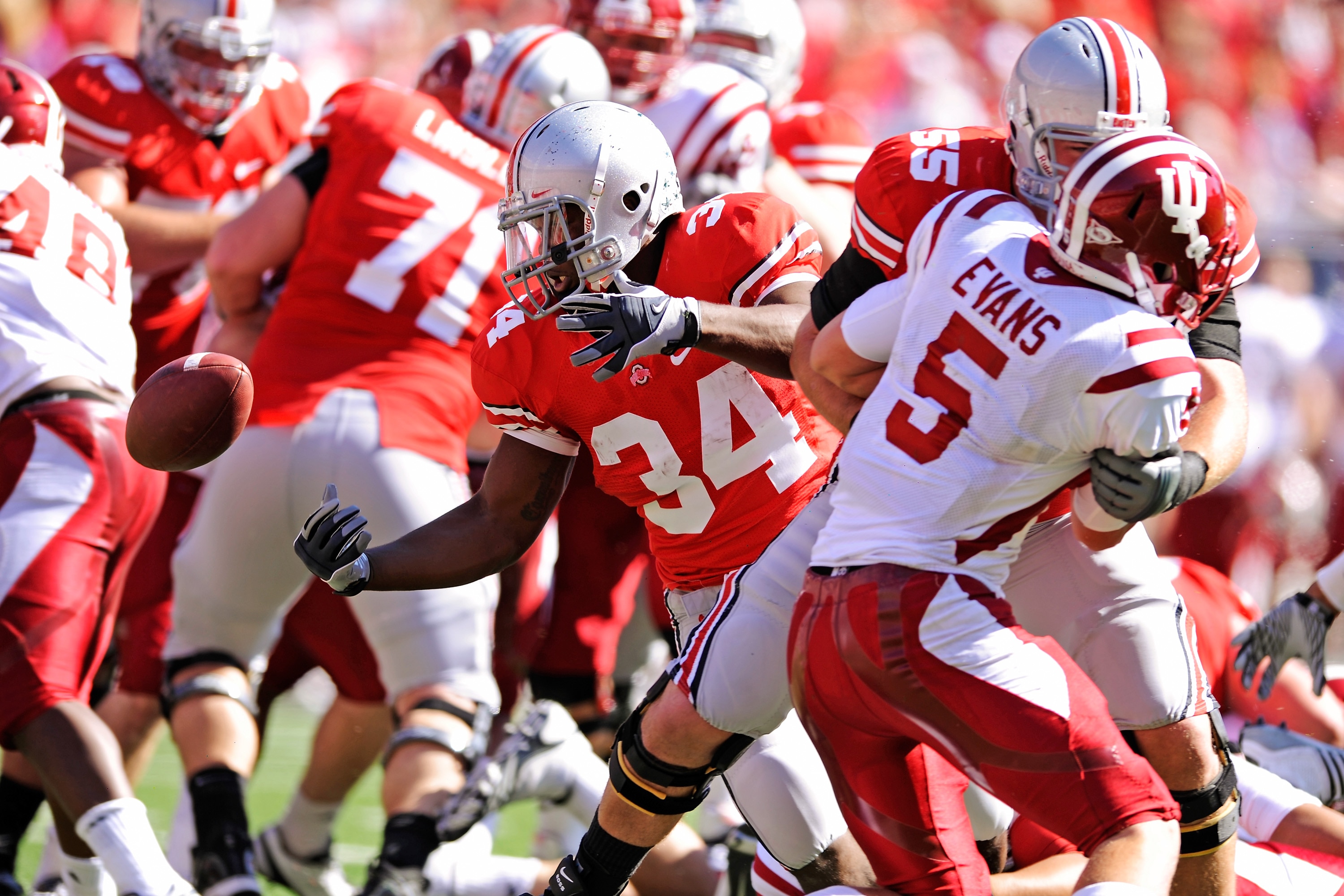 COLUMBUS, OH - OCTOBER 9:  Carlos Hyde #34 of the Ohio State Buckeyes fumbles the ball near the goal line against the Indiana Hoosiers at Ohio Stadium on October 9, 2010 in Columbus, Ohio. Ohio State defeated Indiana 38-10.   (Photo by Jamie Sabau/Getty I
