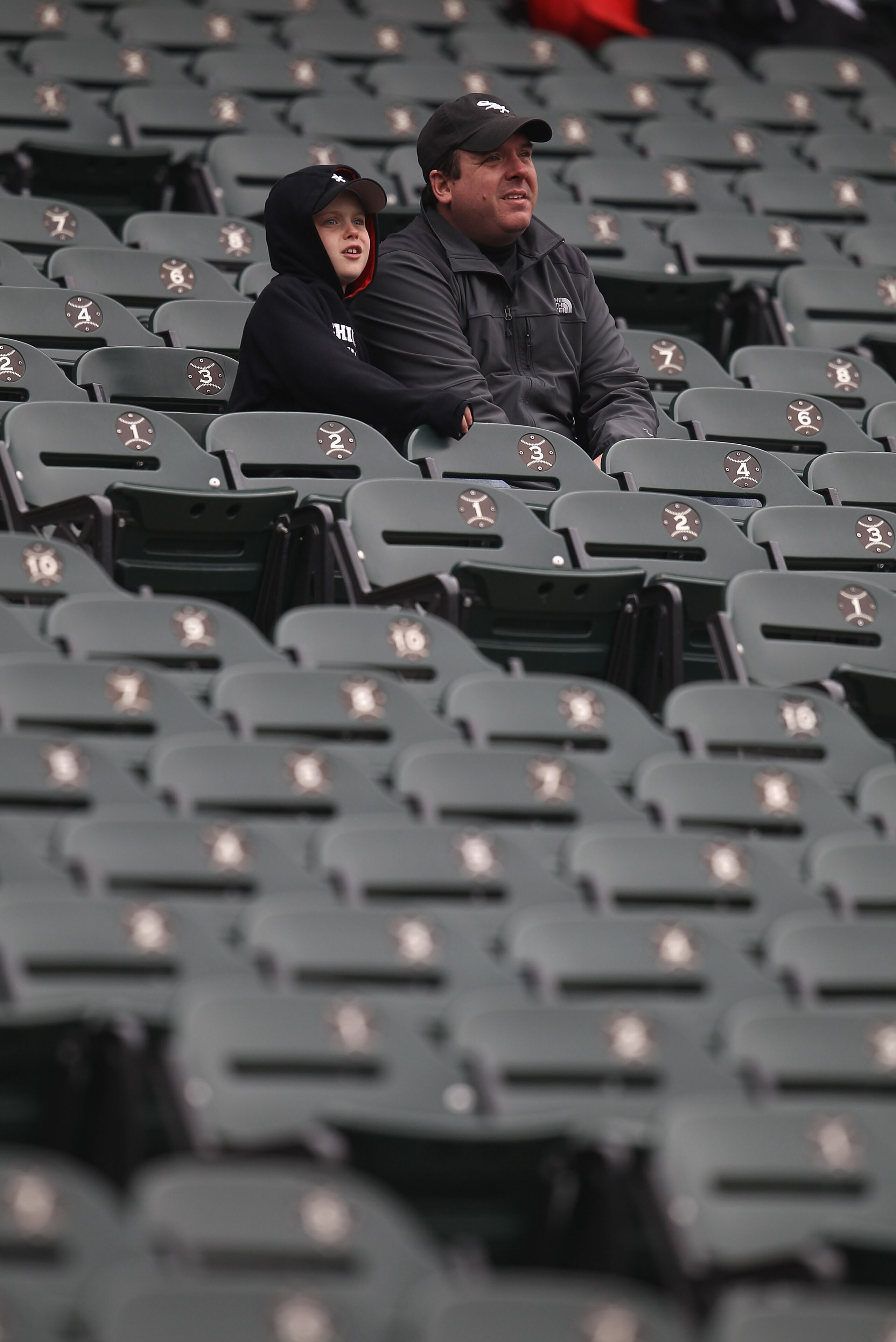 CHICAGO, IL - APRIL 07: Fans of the Chicago White Sox watch batting practice in their seats before the home opener against the Tampa Bay Rays at U.S. Cellular Field on April 7, 2011 in Chicago, Illinois. (Photo by Jonathan Daniel/Getty Images)