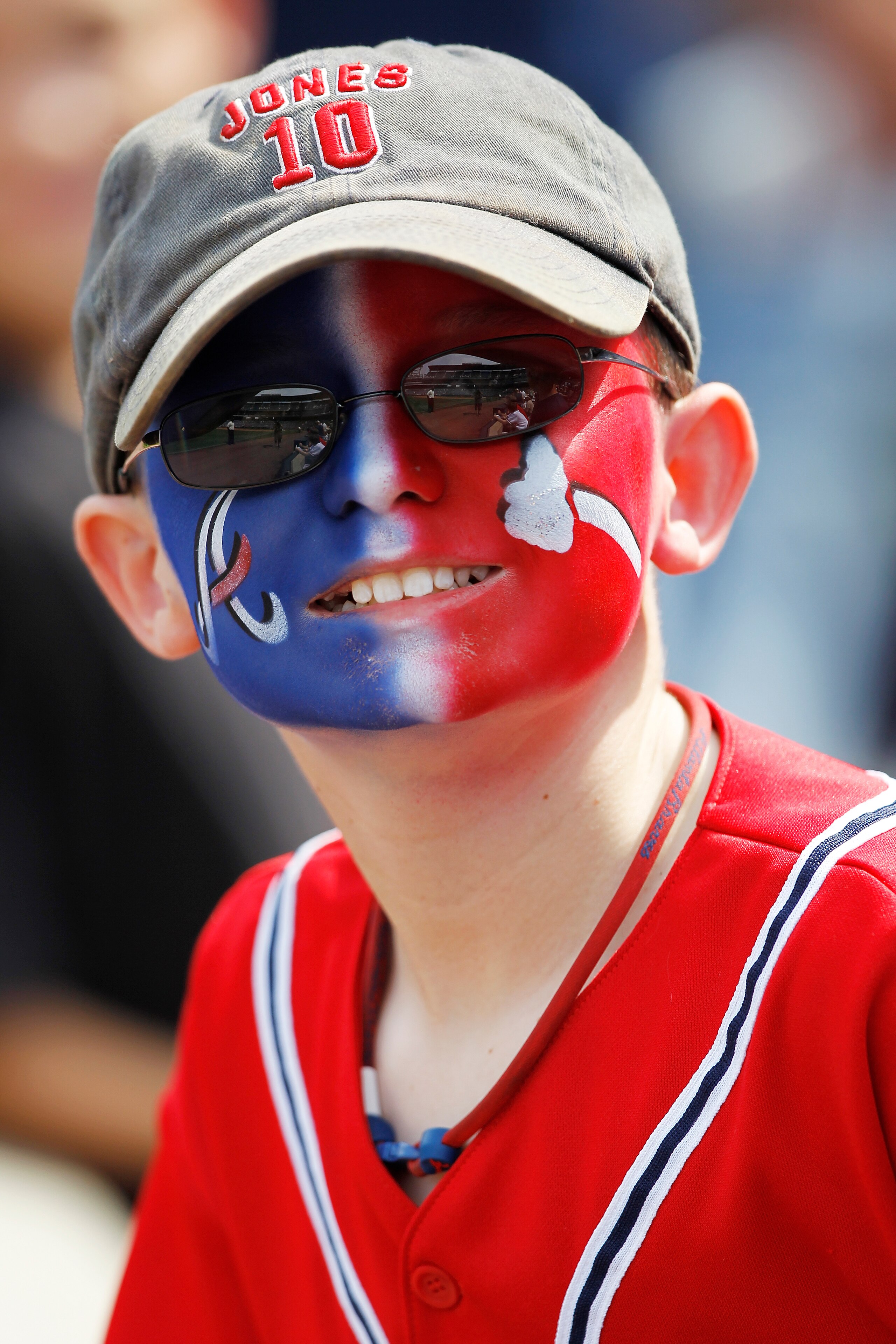 ATLANTA, GA - APRIL 9: A young Atlanta Braves fan looks on during the game against the Philadelphia Phillies at Turner Field on April 9, 2011 in Atlanta, Georgia. The Phillies won 10-2. (Photo by Joe Robbins/Getty Images)