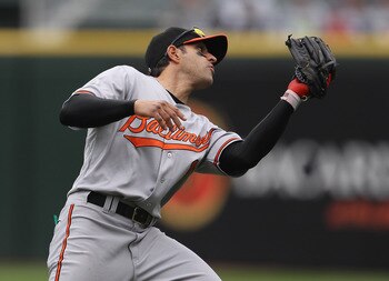 CHICAGO, IL - MAY 01: Brian Roberts #1 of the Baltimore Orioles catches a fly ball against the Chicago White Sox at U.S. Cellular Field on May 1, 2011 in Chicago, Illinois. The Orioles defeated the White Sox 6-4. (Photo by Jonathan Daniel/Getty Images)