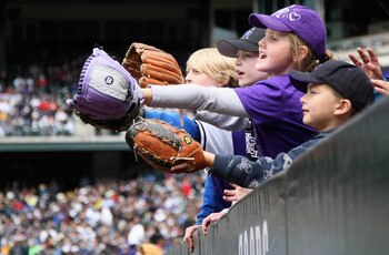 DENVER, CO - MAY 01:  Young fans hope to get a souvenir ball as the Colorado Rockies host the Pittsburgh Pirates at Coors Field on May 1, 2011 in Denver, Colorado. The Pirates defeated the Rockies 8-4.  (Photo by Doug Pensinger/Getty Images)