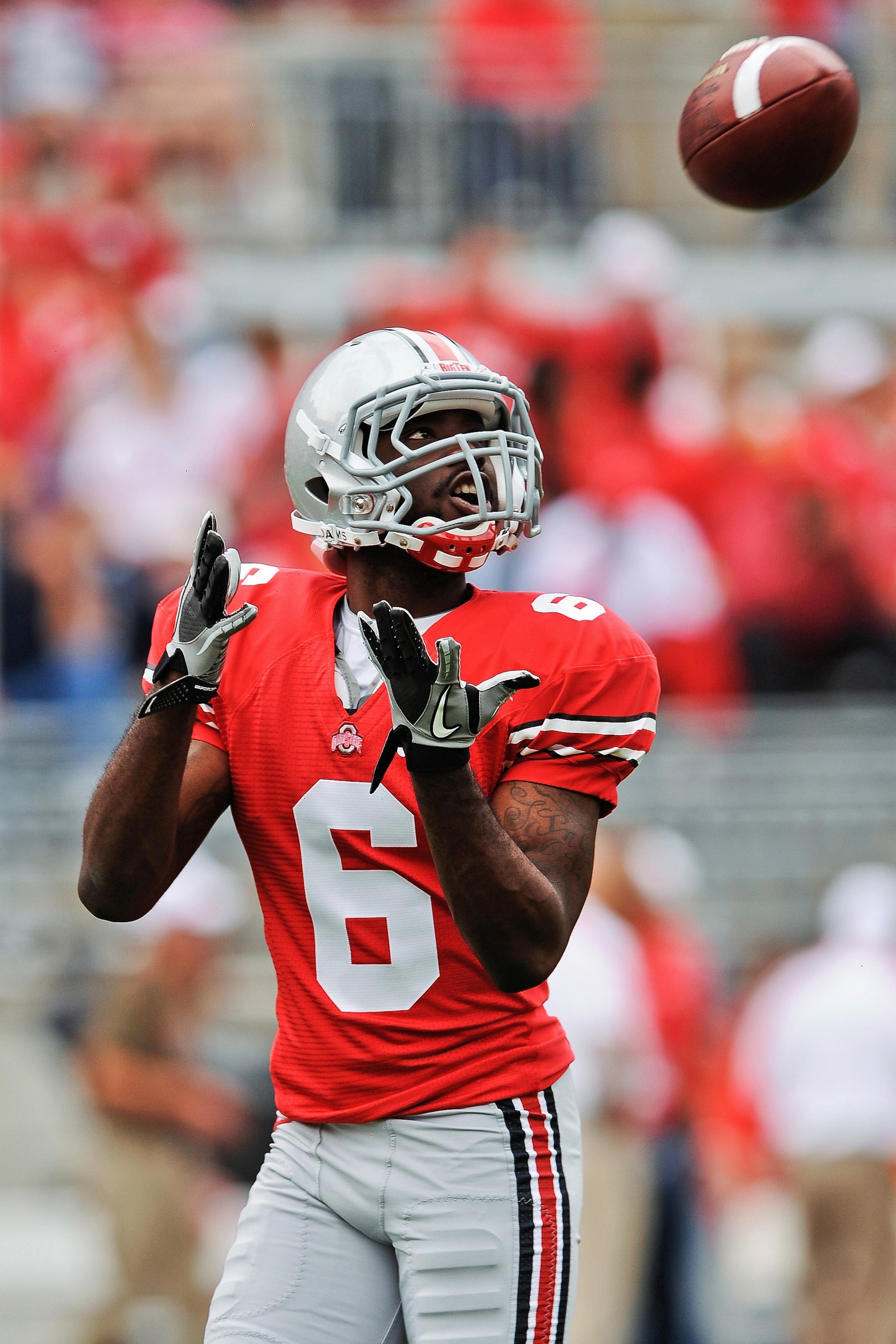 COLUMBUS, OH - SEPTEMBER 11:  James Louis #6 of the Ohio State Buckeyes warms up before a game against the Miami Hurricanes at Ohio Stadium on September 11, 2010 in Columbus, Ohio.  (Photo by Jamie Sabau/Getty Images)