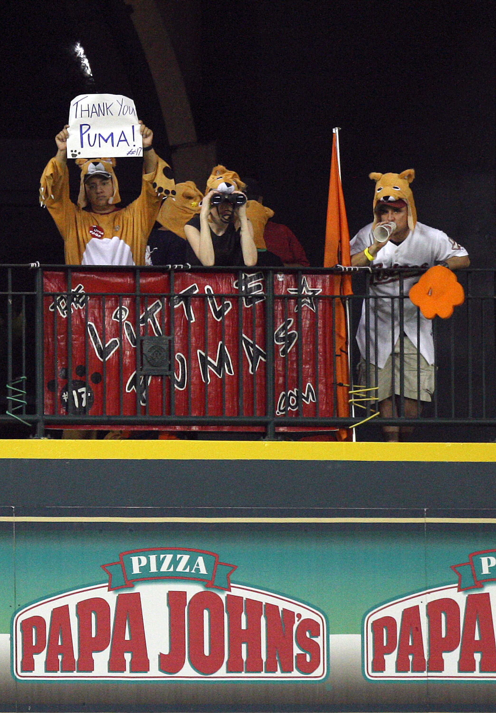 HOUSTON - JULY 30:  Lance Berkman's fan club 'The Little Pumas' hold up a sign displaying 'Thank You Puma!' from their perch in center field at Minute Maid Park on July 30, 2010 in Houston, Texas. There are unoffical reports that Berkman will be traded to