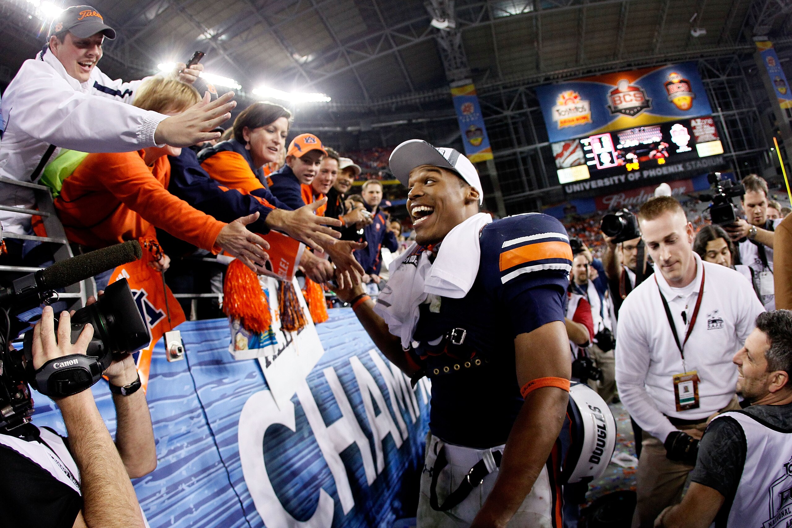 GLENDALE, AZ - JANUARY 10:  Quarterback Cameron Newton #2 of the Auburn Tigers celebrates the Tigers 22-19 victory against the Oregon Ducks in the Tostitos BCS National Championship Game at University of Phoenix Stadium on January 10, 2011 in Glendale, Ar