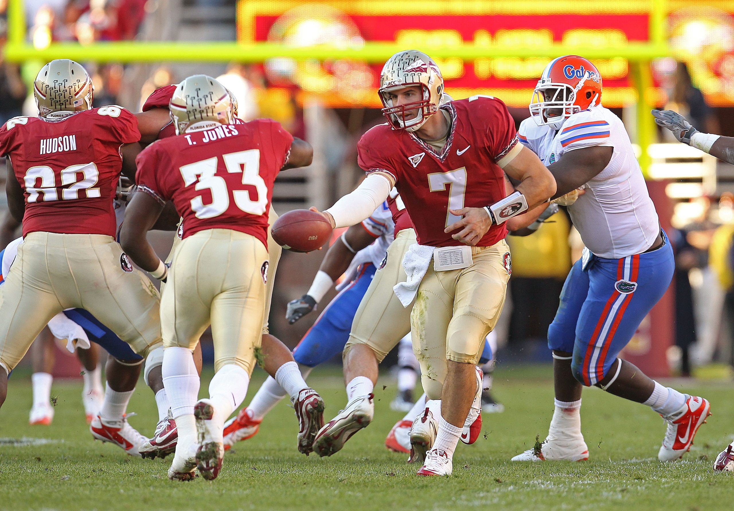 TALLAHASSEE, FL - NOVEMBER 27: Christian Ponder #7 of the Florida State Seminoles hands off to Ty Jones #33 during a game against the Florida Gators at Doak Campbell Stadium on November 27, 2010 in Tallahassee, Florida. (Photo by Mike Ehrmann/Getty Imag TALLAHASSEE, FL - NOVEMBER 27: Christian Ponder #7 of the Florida State Seminoles hands off to Ty Jones #33 during a game against the Florida Gators at Doak Campbell Stadium on November 27, 2010 in Tallahassee, Florida. (Photo by Mike Ehrmann/Getty Imag