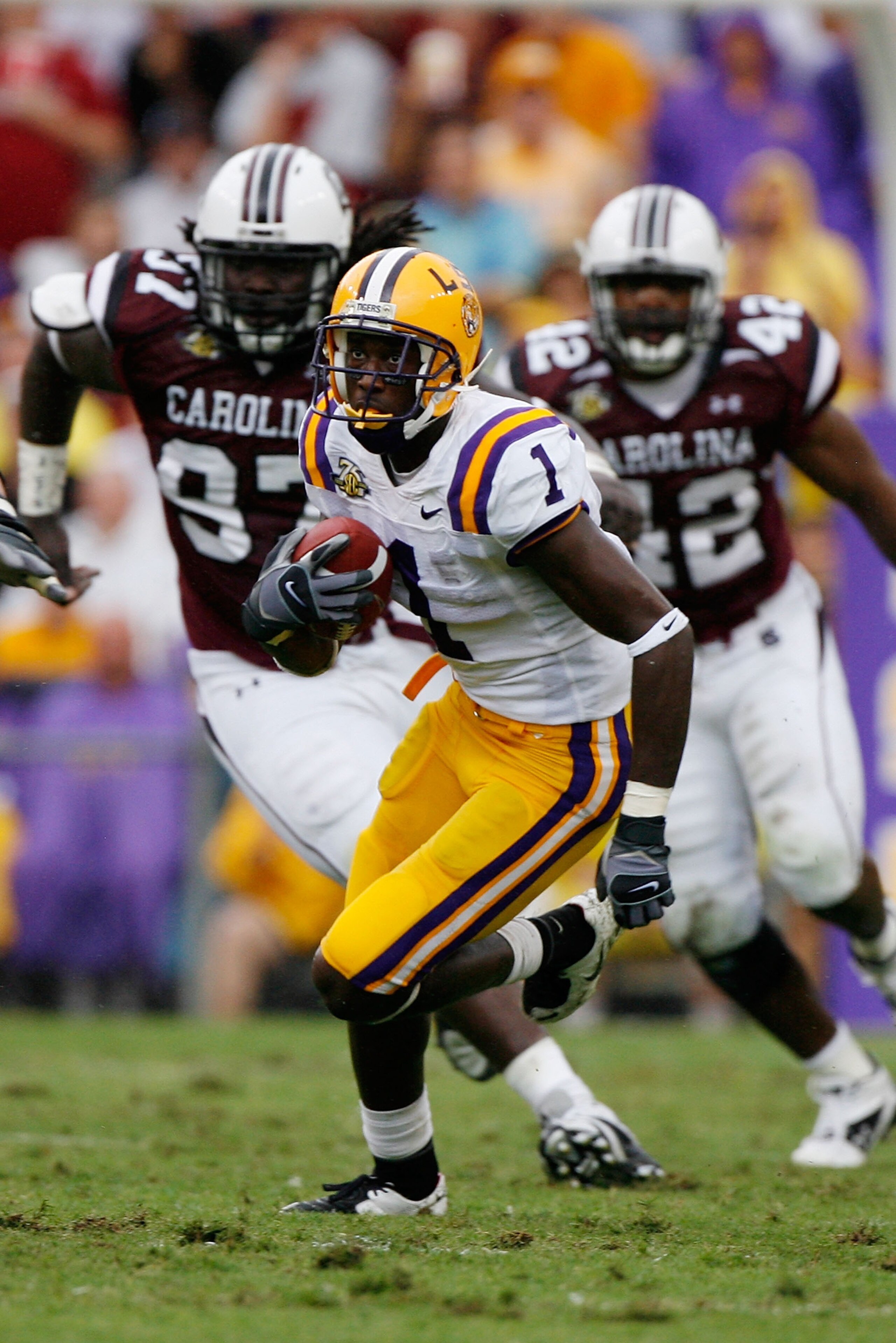 BATON ROUGE, LA - SEPTEMBER 22: Brandon LaFell #1 of the Louisiana State University Tigers runs past Kenrick Ellis #97 and Mike Newton #42 of the South Carolina Gamecocks at Tiger Stadium September 22, 2007 in Baton Rouge, Louisiana. (Photo by Chris G BATON ROUGE, LA - SEPTEMBER 22: Brandon LaFell #1 of the Louisiana State University Tigers runs past Kenrick Ellis #97 and Mike Newton #42 of the South Carolina Gamecocks at Tiger Stadium September 22, 2007 in Baton Rouge, Louisiana. (Photo by Chris G