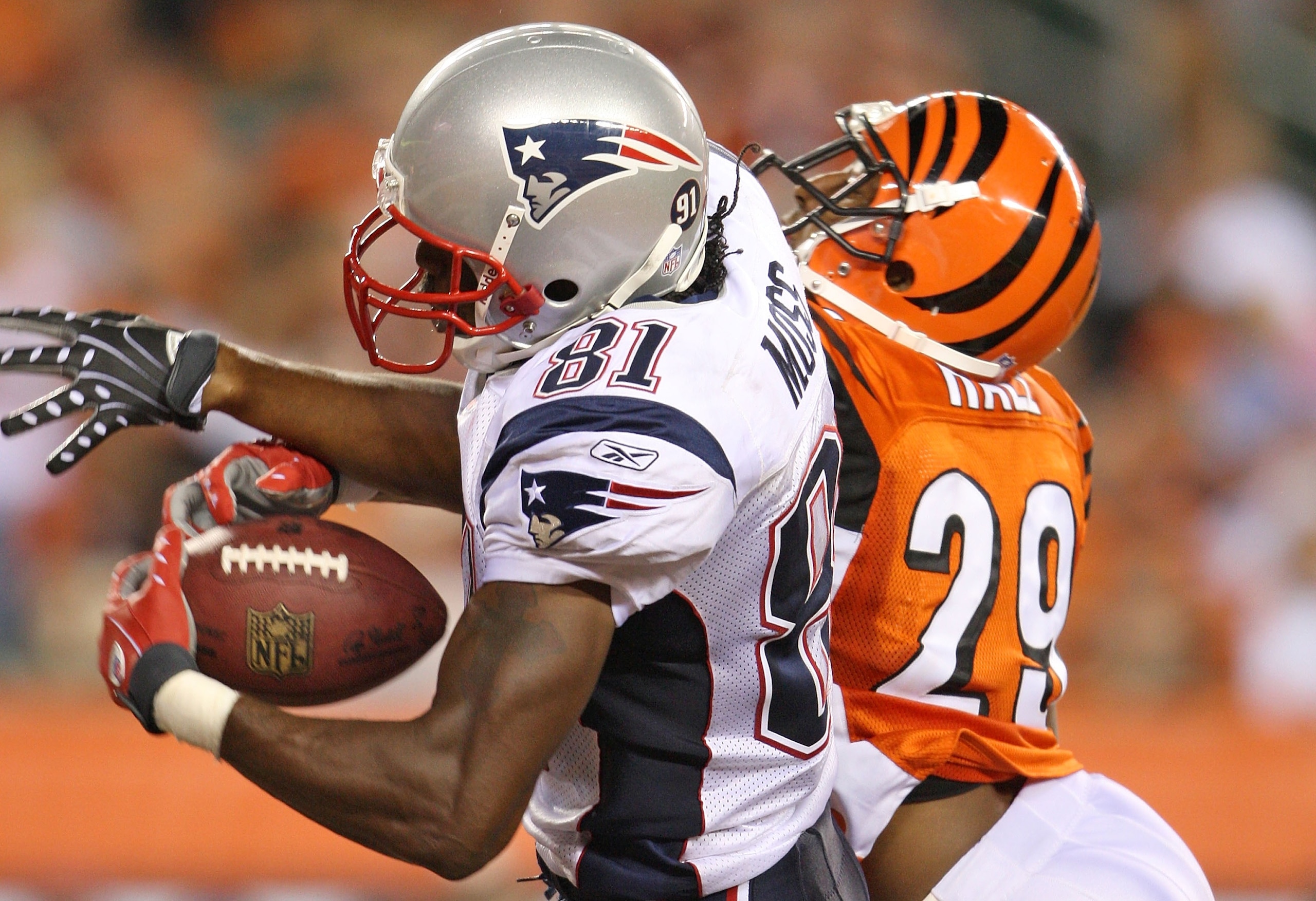 CINCINNATI - OCTOBER 01: Randy Moss #81 of the New England Patriots catches a touchdown pass while defended by Leon Hall #29 of the Cincinnati Bengals during the NFL game on October 1, 2007 at Paul Brown Stadium in Cincinnati, Ohio. (Photo by Andy Lyons CINCINNATI - OCTOBER 01: Randy Moss #81 of the New England Patriots catches a touchdown pass while defended by Leon Hall #29 of the Cincinnati Bengals during the NFL game on October 1, 2007 at Paul Brown Stadium in Cincinnati, Ohio. (Photo by Andy Lyons