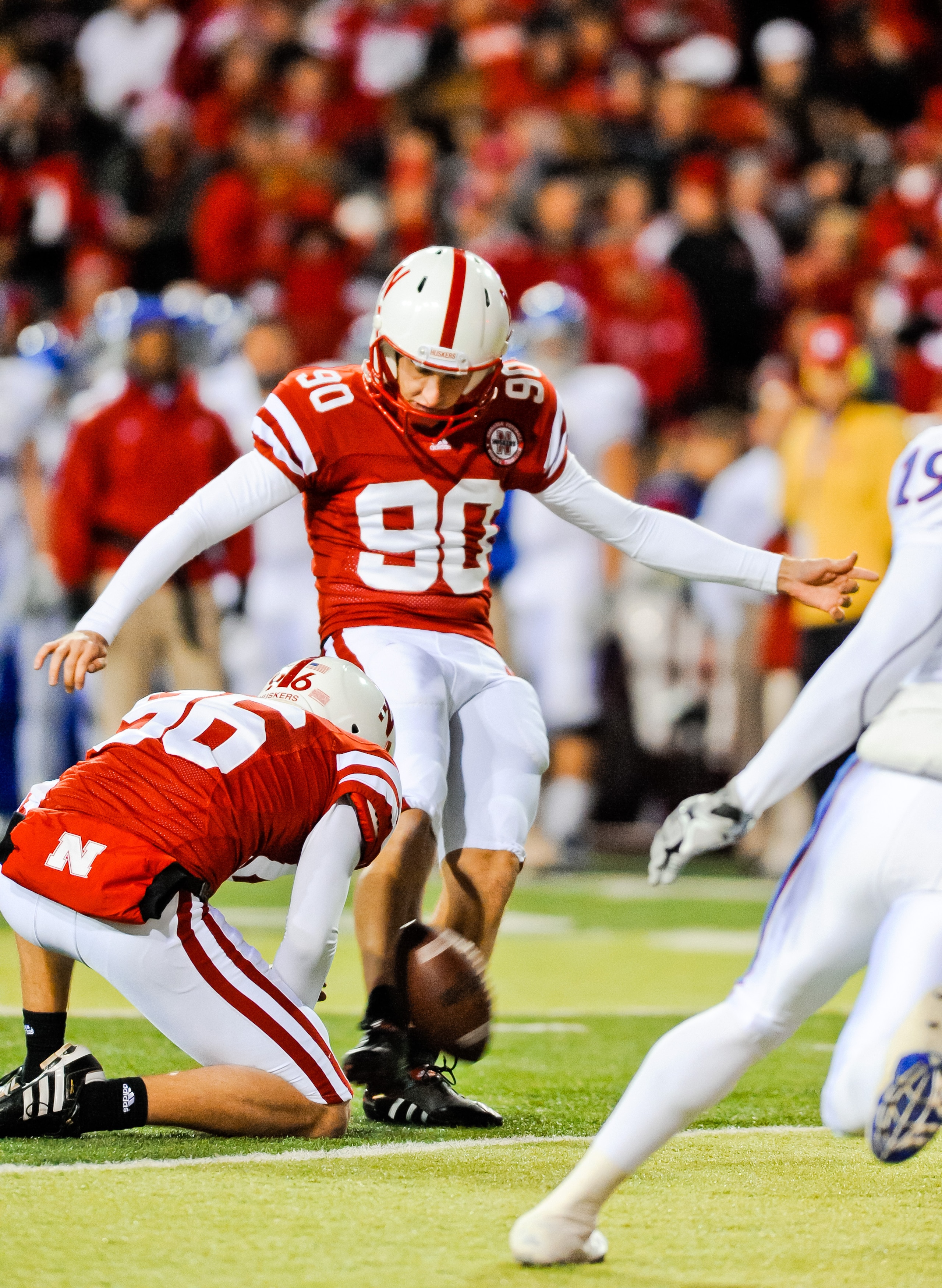 LINCOLN, NE - NOVEMBER 13: Alex Henery #90 of the Nebraska Cornhuskers kicks an extra point against the Kansas Jayhawks during their game at Memorial Stadium on November 13, 2010 in Lincoln, Nebraska. Nebraska Defeated Kansas 20-3. (Photo by Eric Francis/ LINCOLN, NE - NOVEMBER 13: Alex Henery #90 of the Nebraska Cornhuskers kicks an extra point against the Kansas Jayhawks during their game at Memorial Stadium on November 13, 2010 in Lincoln, Nebraska. Nebraska Defeated Kansas 20-3. (Photo by Eric Francis/