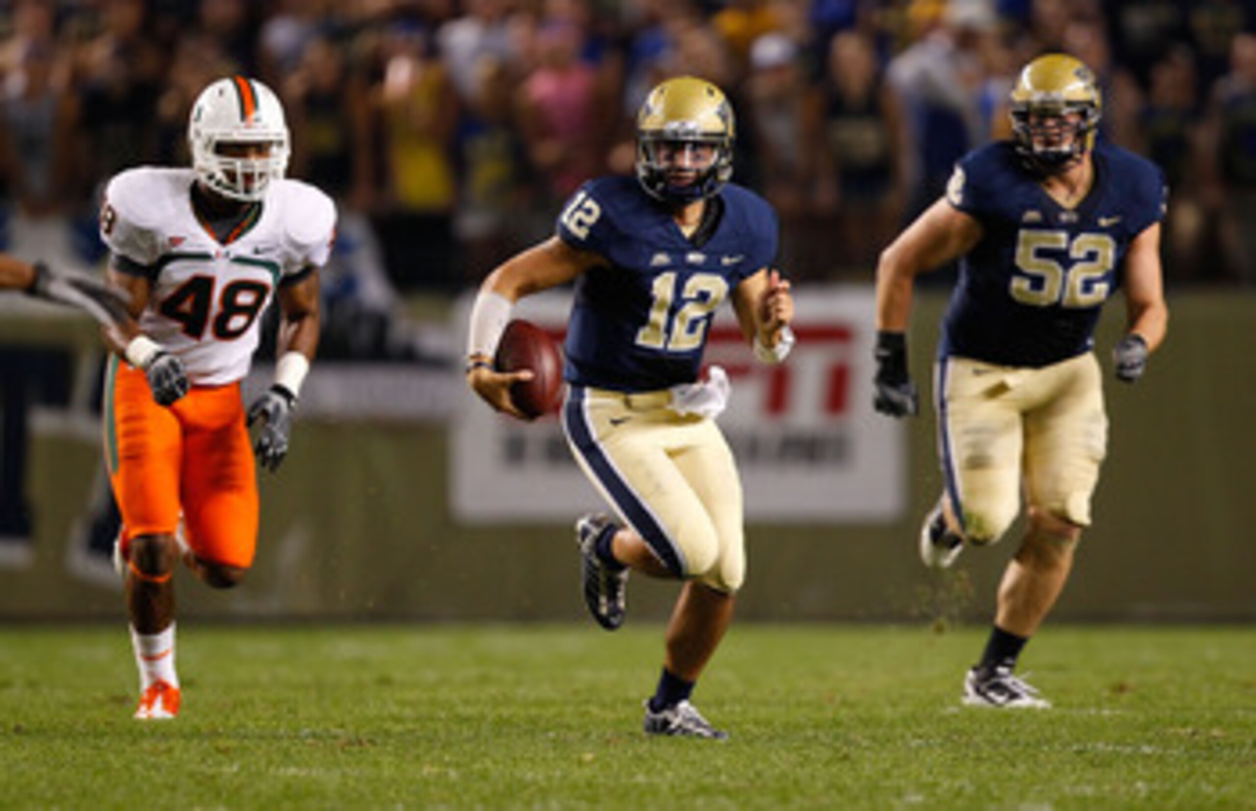 PITTSBURGH - SEPTEMBER 23: Tino Sunseri #12 of the Pittsburgh Panthers runs with the ball against the Miami Hurricanes on September 23, 2010 at Heinz Field in Pittsburgh, Pennsylvania. (Photo by Jared Wickerham/Getty Images) PITTSBURGH - SEPTEMBER 23: Tino Sunseri #12 of the Pittsburgh Panthers runs with the ball against the Miami Hurricanes on September 23, 2010 at Heinz Field in Pittsburgh, Pennsylvania. (Photo by Jared Wickerham/Getty Images)