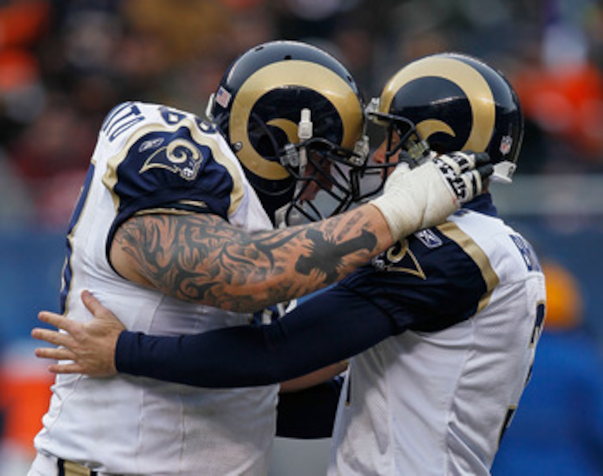 CHICAGO - DECEMBER 06: Richie Incognito #68 (L) of the St. Louis Rams congratulates kicker Josh Brown #3 after Brown hit a 50 yard field goal against the Chicago Bears at Soldier Field on December 6, 2009 in Chicago, Illinois. The Bears defeated the Rams 