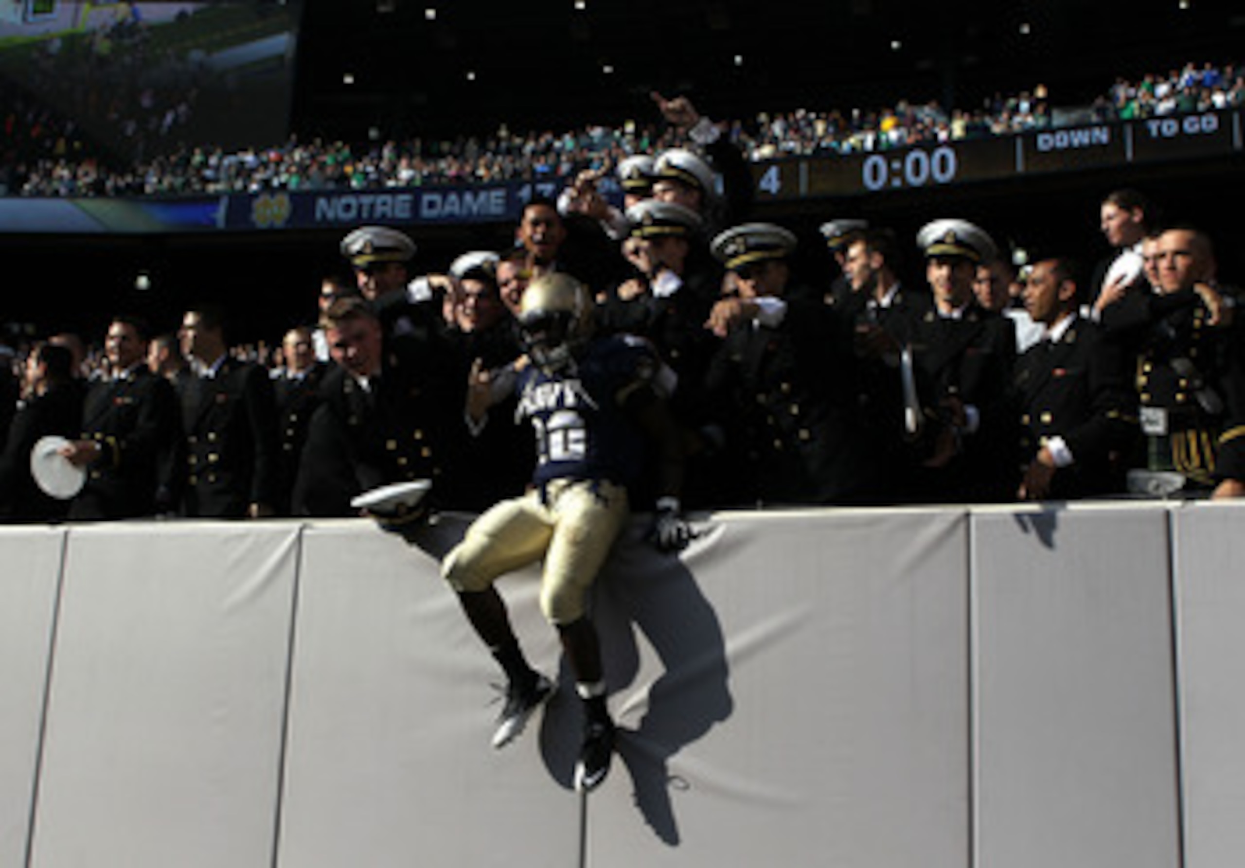 EAST RUTHERFORD, NJ - OCTOBER 23: Andre Byrd #20 of the Navy Midshipmen celebrates the win against the Notre Dame Fighting Irish at New Meadowlands Stadium on October 23, 2010 in East Rutherford, New Jersey. (Photo by Nick Laham/Getty Images) EAST RUTHERFORD, NJ - OCTOBER 23: Andre Byrd #20 of the Navy Midshipmen celebrates the win against the Notre Dame Fighting Irish at New Meadowlands Stadium on October 23, 2010 in East Rutherford, New Jersey. (Photo by Nick Laham/Getty Images)