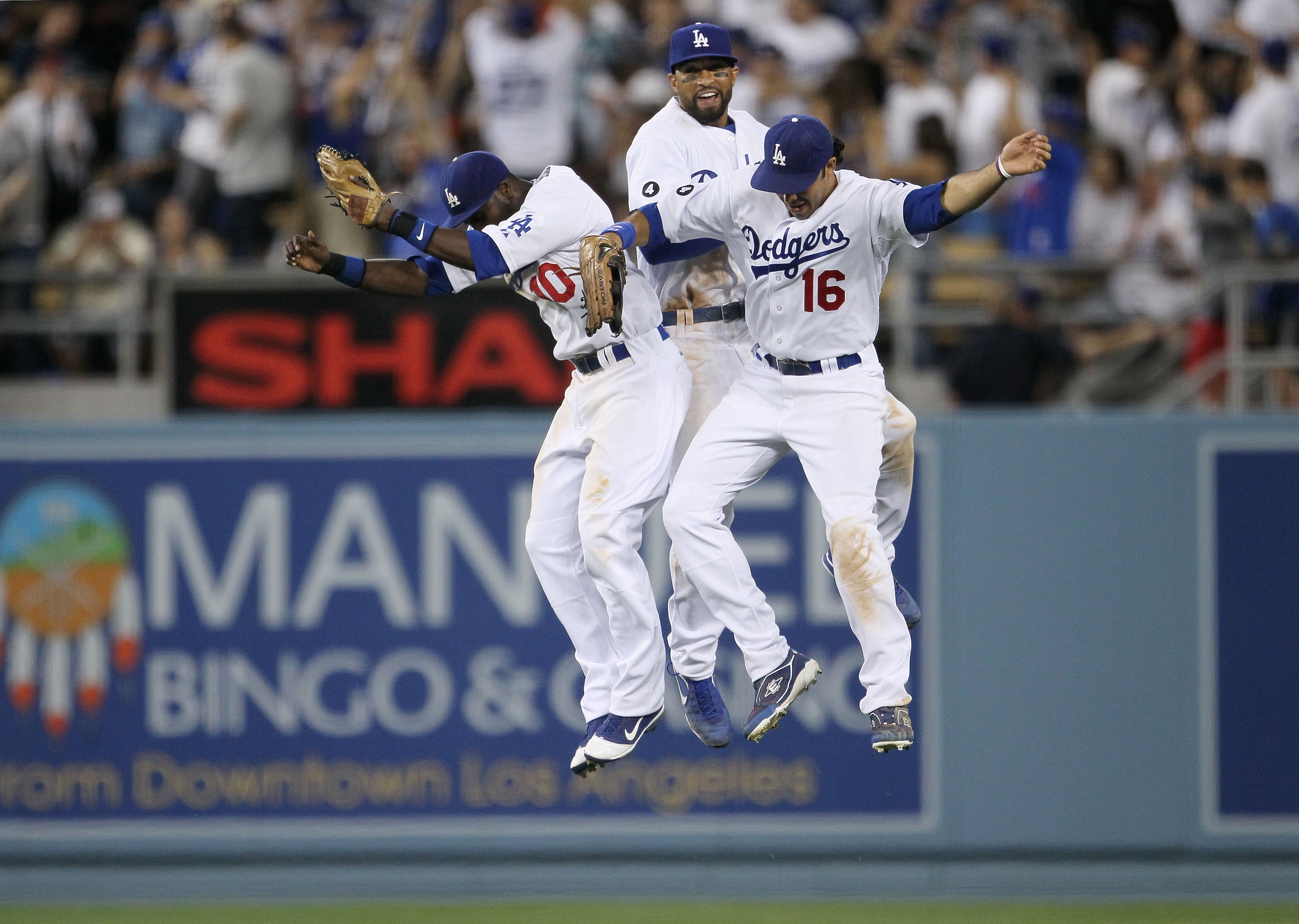LOS ANGELES, CA - MARCH 31: Tony Gwynn #10, Matt Kemp #27 and Andre Ethier #16 of the Los Angeles Dodgers celebrate their 2-1 win over the San Francisco Giants on Opening Day at Dodger Stadium on March 31, 2011 in Los Angeles, California. (Photo by Jeff LOS ANGELES, CA - MARCH 31: Tony Gwynn #10, Matt Kemp #27 and Andre Ethier #16 of the Los Angeles Dodgers celebrate their 2-1 win over the San Francisco Giants on Opening Day at Dodger Stadium on March 31, 2011 in Los Angeles, California. (Photo by Jeff