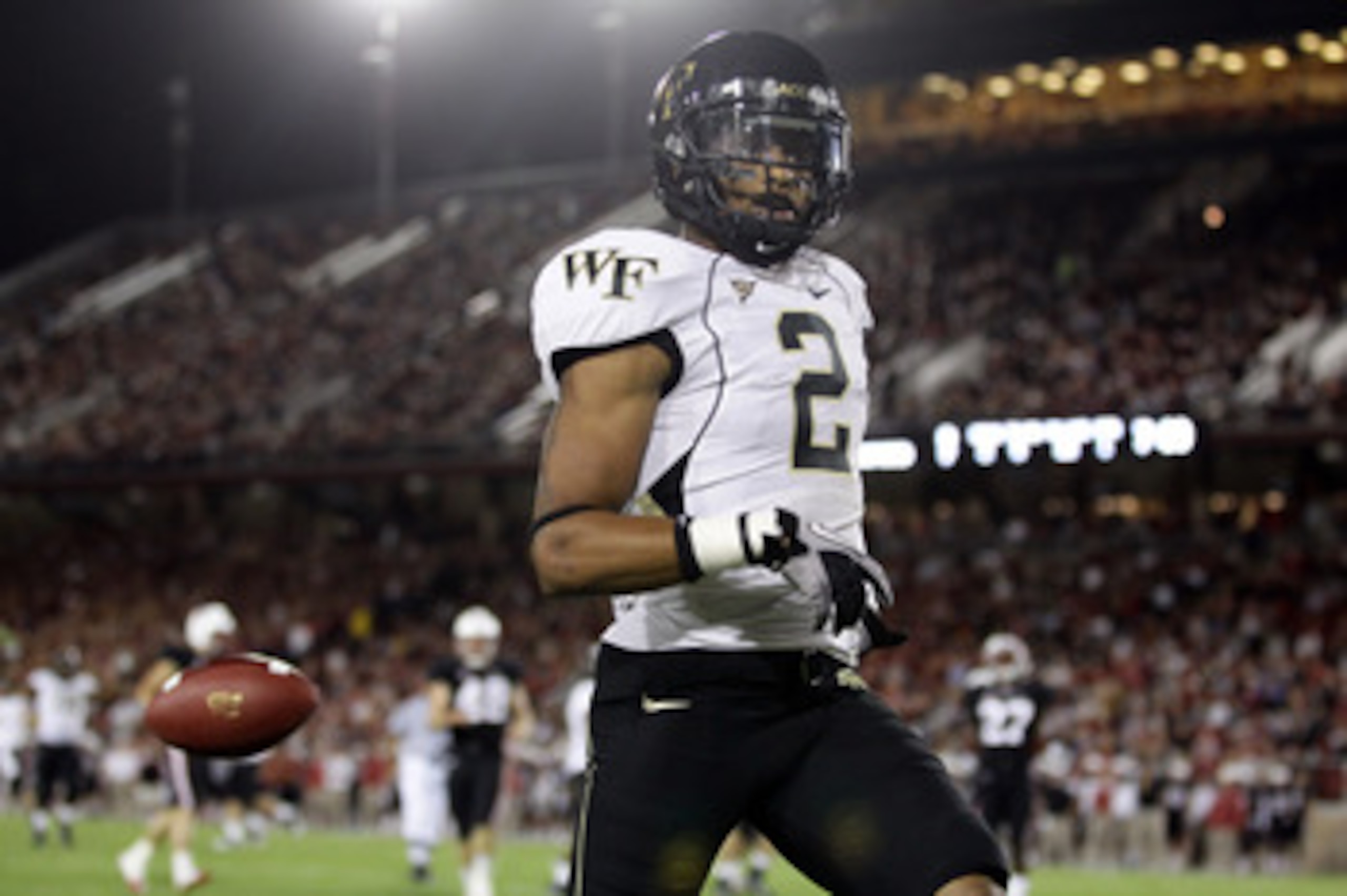 PALO ALTO, CA - SEPTEMBER 18: Chris Givens #2 of the Wake Forest Demon Deacons runs in for a touchdown against the Stanford Cardinal at Stanford Stadium on September 18, 2010 in Palo Alto, California. (Photo by Ezra Shaw/Getty Images) PALO ALTO, CA - SEPTEMBER 18: Chris Givens #2 of the Wake Forest Demon Deacons runs in for a touchdown against the Stanford Cardinal at Stanford Stadium on September 18, 2010 in Palo Alto, California. (Photo by Ezra Shaw/Getty Images)