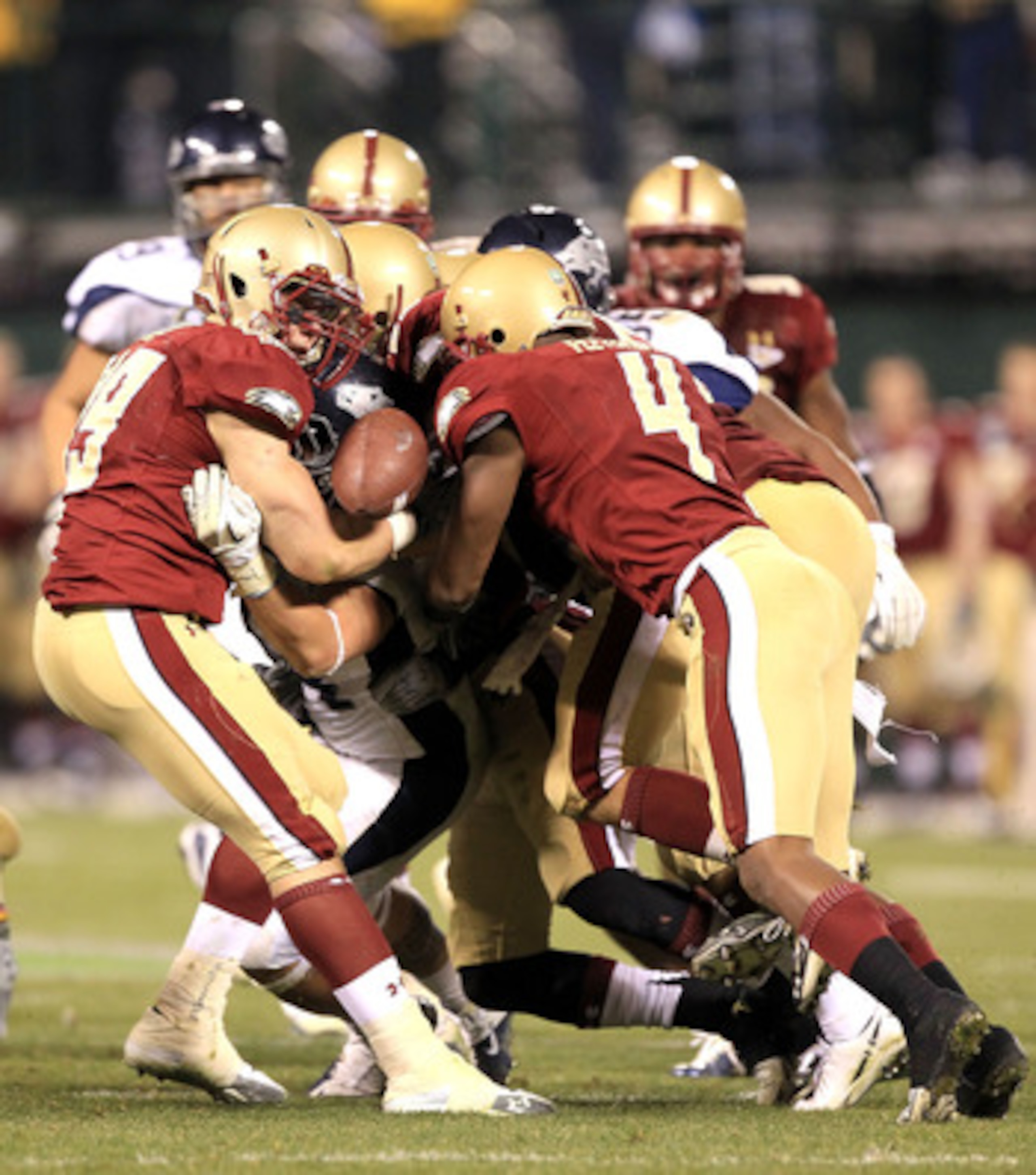 SAN FRANCISCO, CA - JANUARY 09: Vai Taua #34 of the Nevada Wolf Pack fumbles the ball during their game against Boston College in the Kraft Fight Hunger Bowl at AT&T Park on January 9, 2011 in San Francisco, California. (Photo by Ezra Shaw/Getty Images) SAN FRANCISCO, CA - JANUARY 09: Vai Taua #34 of the Nevada Wolf Pack fumbles the ball during their game against Boston College in the Kraft Fight Hunger Bowl at AT&T Park on January 9, 2011 in San Francisco, California. (Photo by Ezra Shaw/Getty Images)