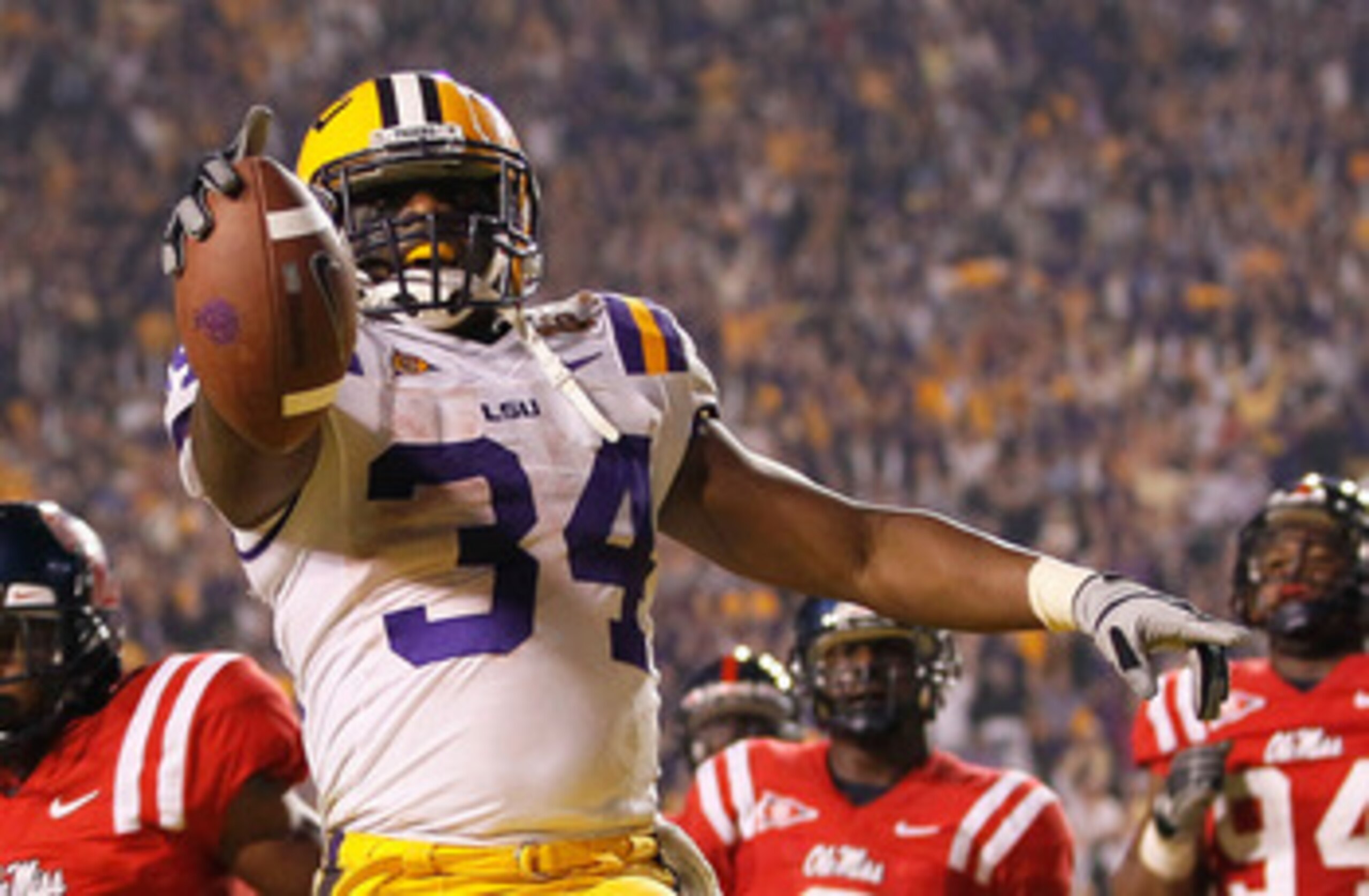 BATON ROUGE, LA - NOVEMBER 20: Stevan Ridley #34 of the Louisiana State University Tigers against the Ole Miss Rebels at Tiger Stadium on November 20, 2010 in Baton Rouge, Louisiana. (Photo by Kevin C. Cox/Getty Images) BATON ROUGE, LA - NOVEMBER 20: Stevan Ridley #34 of the Louisiana State University Tigers against the Ole Miss Rebels at Tiger Stadium on November 20, 2010 in Baton Rouge, Louisiana. (Photo by Kevin C. Cox/Getty Images)