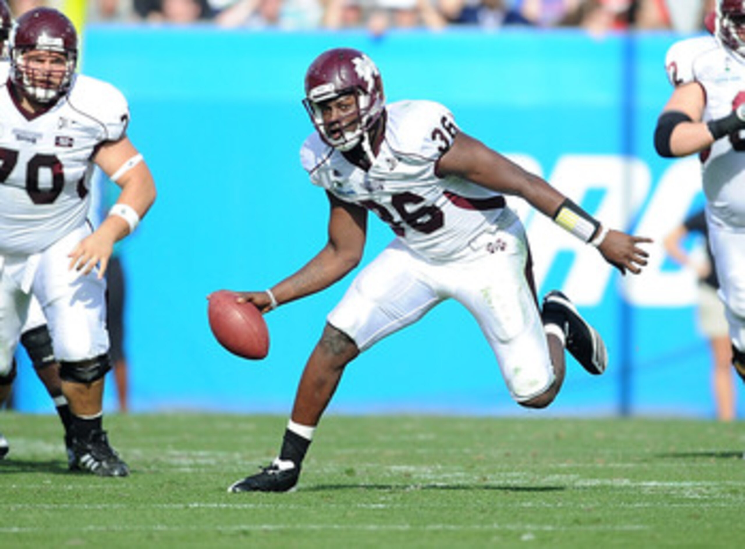 JACKSONVILLE, FL - JANUARY 01: Quarterback Chris Relf# 36 of the Mississippi State Bulldogs rushes against the Michigan Wolverines during the Gator Bowl at EverBank Field on January 1, 2011 in Jacksonville, Florida (Photo by Rick Dole/Getty Images) JACKSONVILLE, FL - JANUARY 01: Quarterback Chris Relf# 36 of the Mississippi State Bulldogs rushes against the Michigan Wolverines during the Gator Bowl at EverBank Field on January 1, 2011 in Jacksonville, Florida (Photo by Rick Dole/Getty Images)