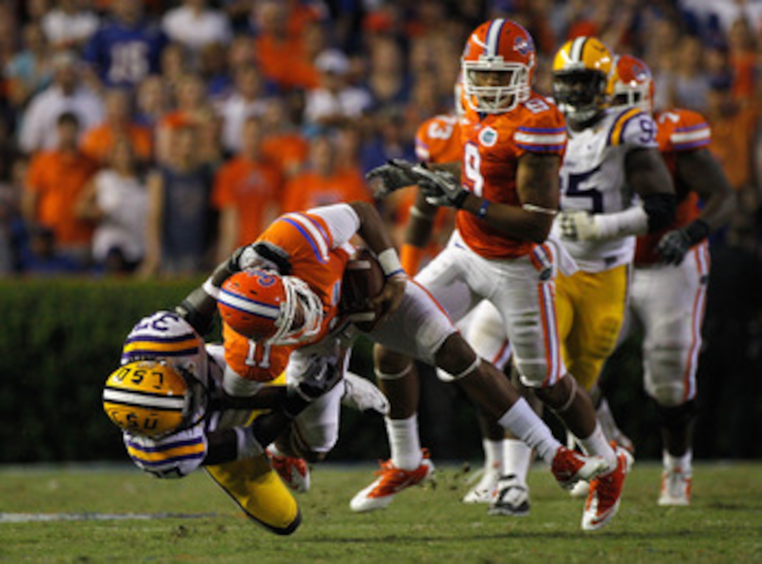 GAINESVILLE, FL - OCTOBER 09: Brandon Worle #32 of the Louisiana State University Tigers tackles Jordan Reed #11 of the Florida Gators during the game at Ben Hill Griffin Stadium on October 9, 2010 in Gainesville, Florida. (Photo by Sam Greenwood/Getty GAINESVILLE, FL - OCTOBER 09: Brandon Worle #32 of the Louisiana State University Tigers tackles Jordan Reed #11 of the Florida Gators during the game at Ben Hill Griffin Stadium on October 9, 2010 in Gainesville, Florida. (Photo by Sam Greenwood/Getty