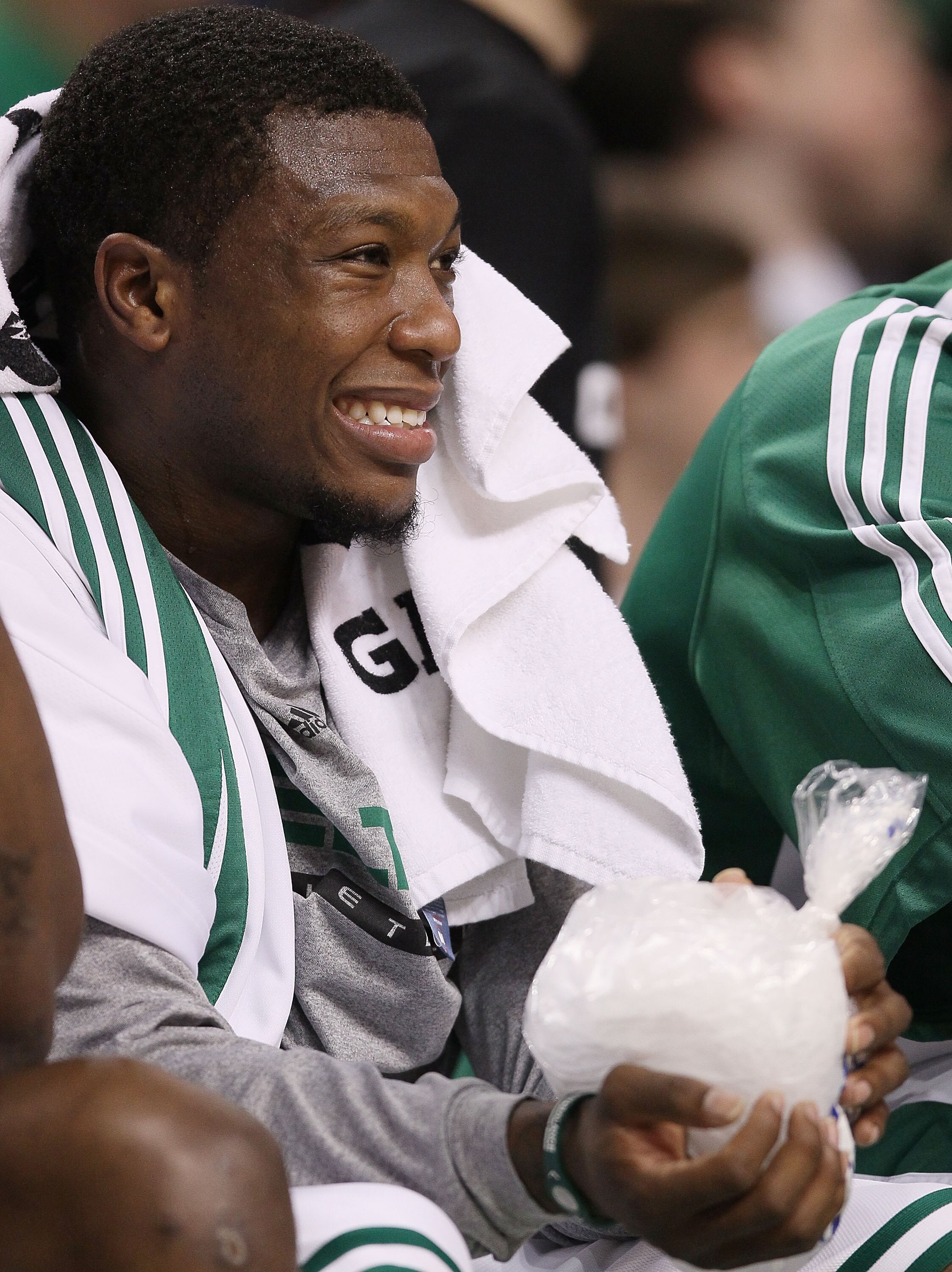 BOSTON - MARCH 31:  Nate Robinson #4 of the Boston Celtics ices his hand as he sits on the bench in the fourth quarter against the Oklahoma City Thunder on March 31, 2010 at the TD Garden in Boston, Massachusetts. The Oklahoma City Thunder defeated the Bo