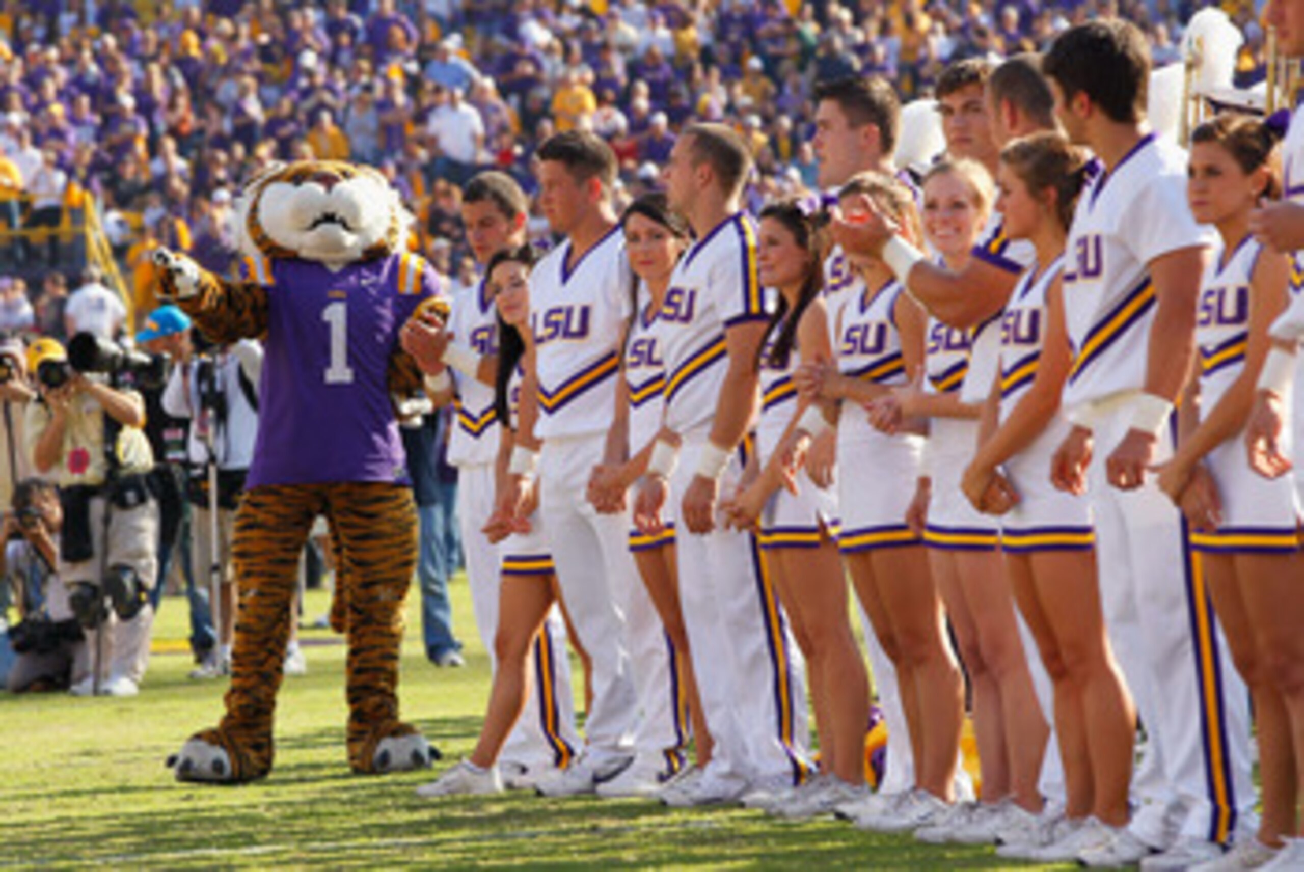 BATON ROUGE, LA - NOVEMBER 20: Mike the Tiger and the cheerleaders of the Louisiana State University Tigers cheer before facing the Ole Miss Rebels at Tiger Stadium on November 20, 2010 in Baton Rouge, Louisiana. (Photo by Kevin C. Cox/Getty Images) BATON ROUGE, LA - NOVEMBER 20: Mike the Tiger and the cheerleaders of the Louisiana State University Tigers cheer before facing the Ole Miss Rebels at Tiger Stadium on November 20, 2010 in Baton Rouge, Louisiana. (Photo by Kevin C. Cox/Getty Images)