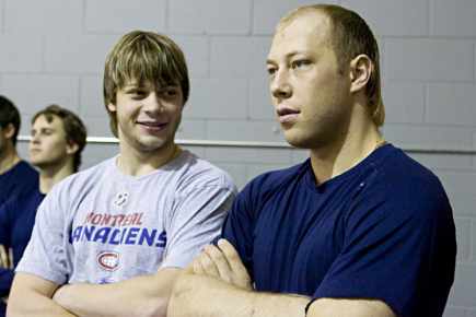 Brother Sergei Kostitsyn seen here staying at his brother's new haircut. He's enjoying a good chuckle about it.