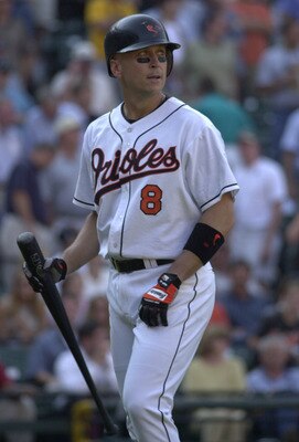 5 Oct 2001:  Cal Ripken #8 of the Baltimore Orioles returns the bench after a foul pop fly out as the Boston Red Sox defeated the Baltimore Orioles 5-0 at Oriole Park at Camden Yards in Baltimore, Maryland. <<<DIGITAL IMAGE>> Mandatory Credit: Doug Pensin