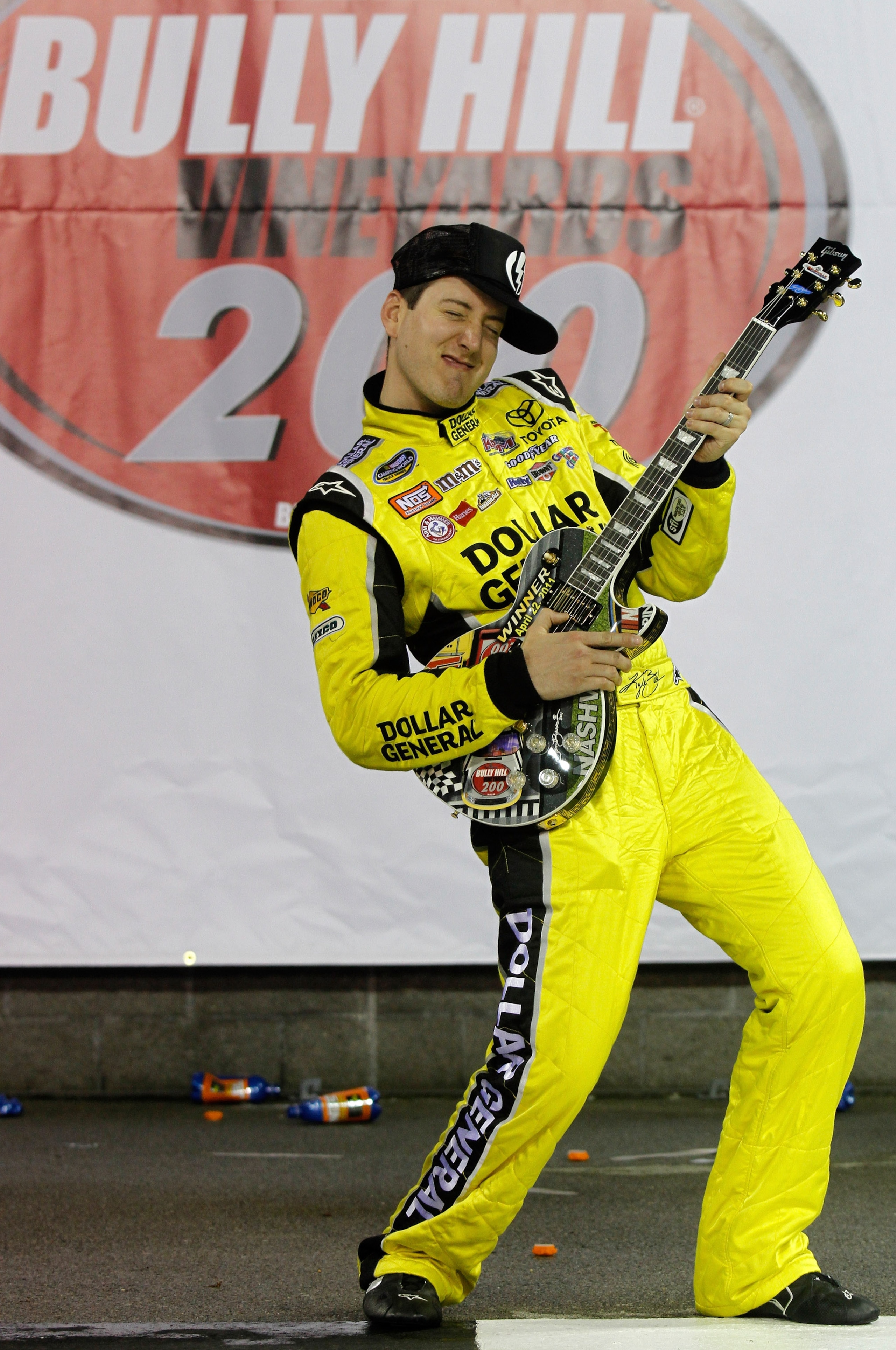LEBANON, TN - APRIL 22: Kyle Busch, driver of the #18 Dollar General Toyota celebrates in victory lane after winning the NASCAR Camping World Truck Series Bully Hill Vineyards 200 at Nashville Superspeedway on April 22, 2011 in Lebanon, Tennessee. (Phot LEBANON, TN - APRIL 22: Kyle Busch, driver of the #18 Dollar General Toyota celebrates in victory lane after winning the NASCAR Camping World Truck Series Bully Hill Vineyards 200 at Nashville Superspeedway on April 22, 2011 in Lebanon, Tennessee. (Phot